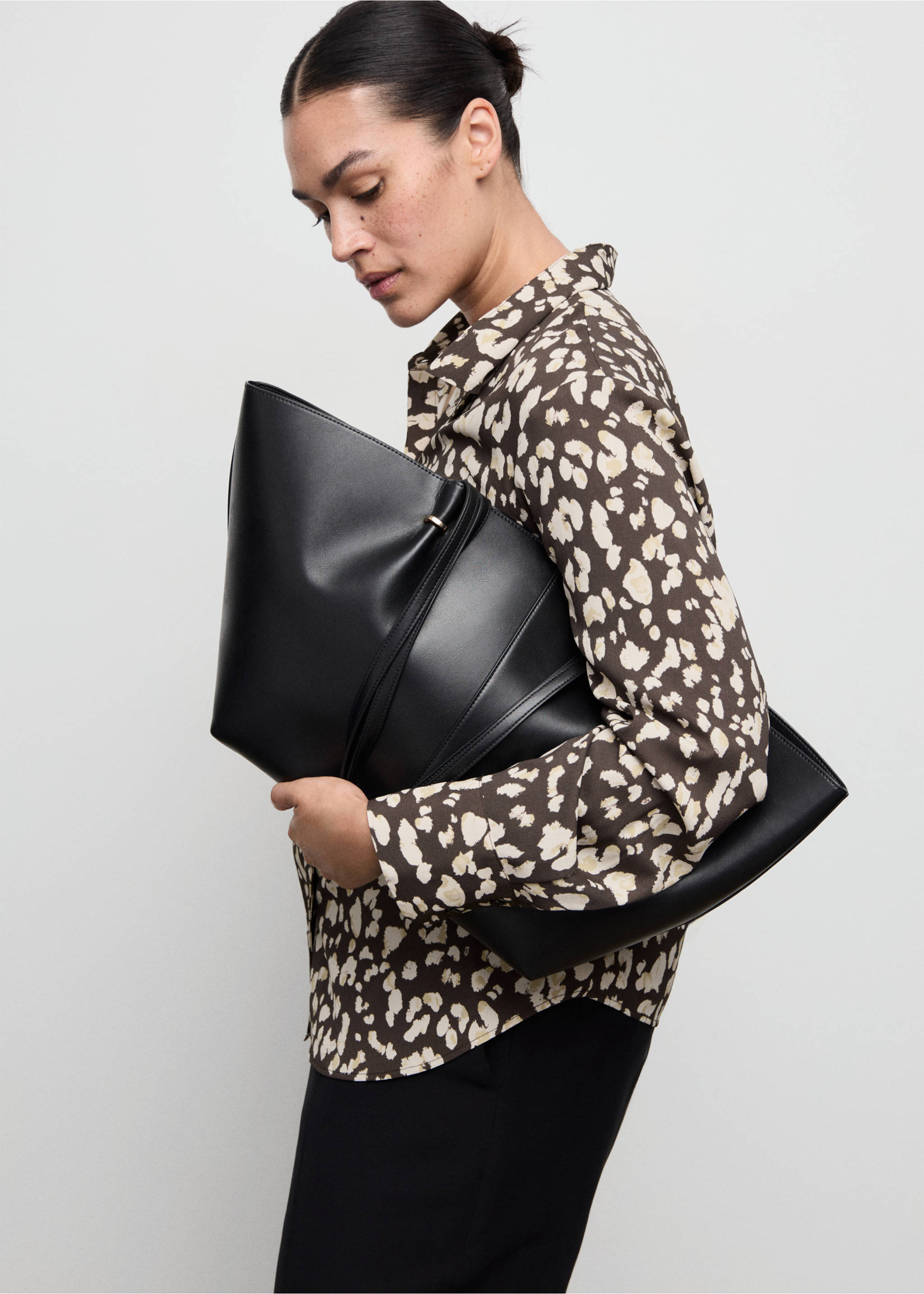 Brown animal-print shirt with a classic collar, worn with a large black bag., Brown. Ref: 27051236-00.