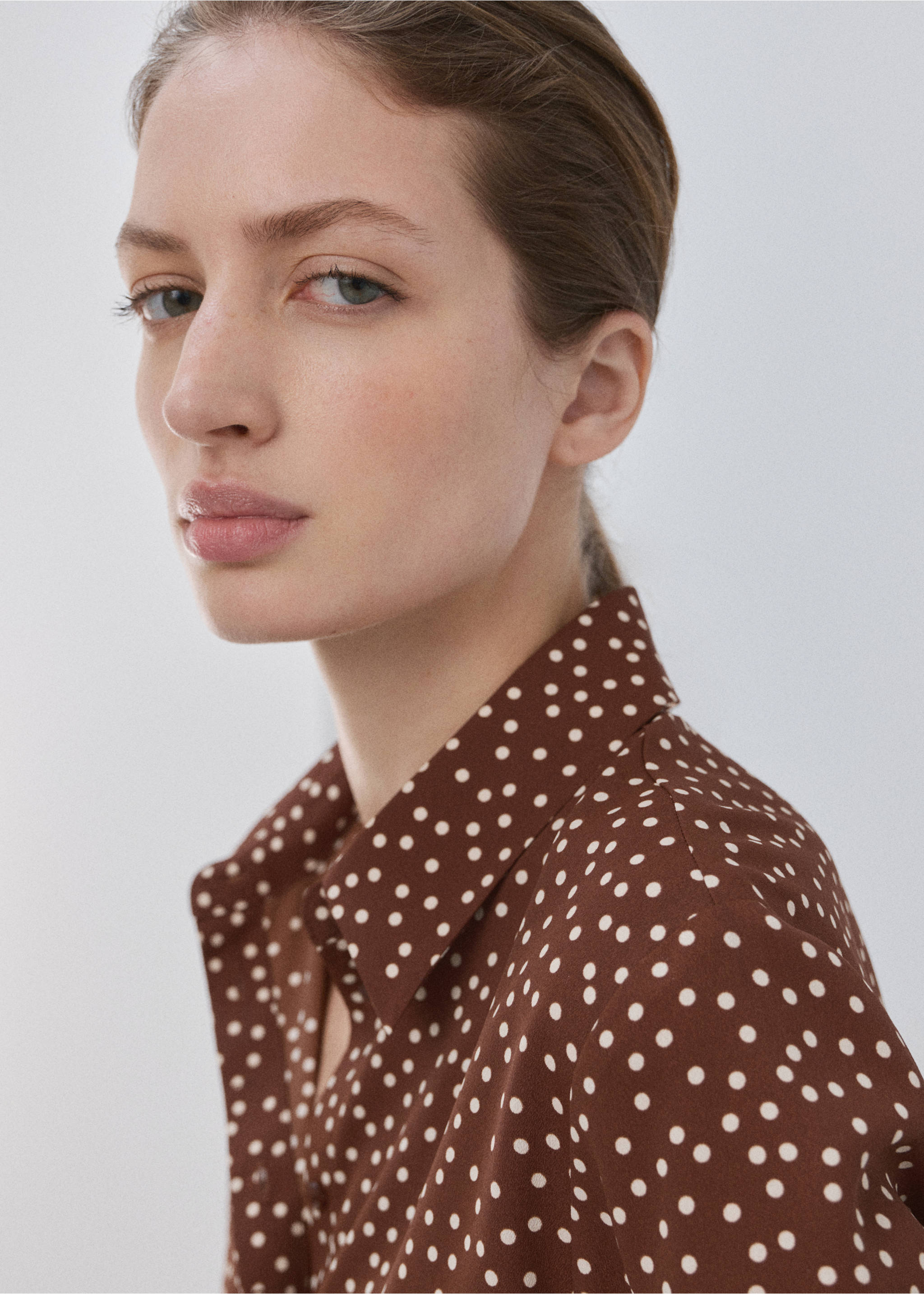 Brown polka dot shirt with a classic collar in a close-up model view., Tobacco Brown. Ref: 27051236-00.