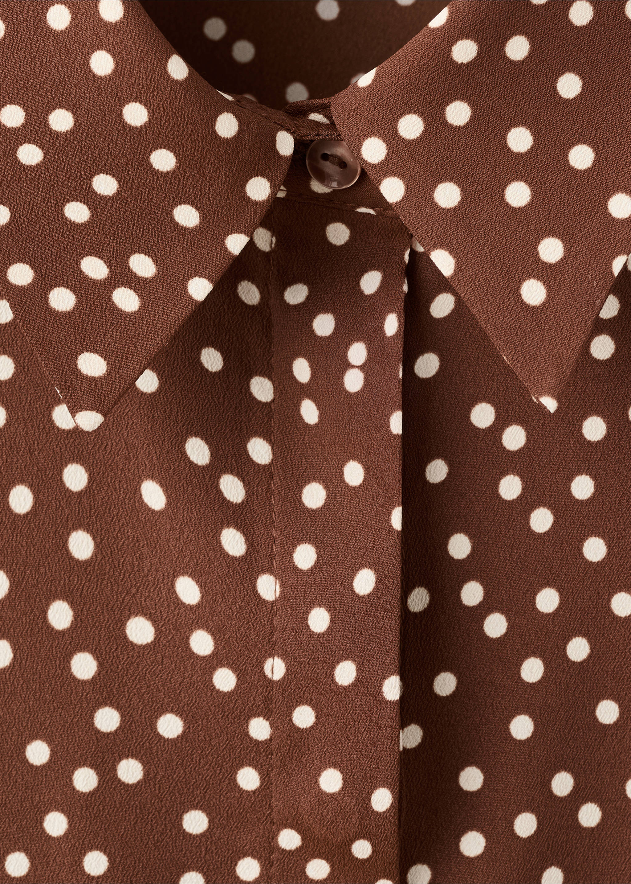 Brown polka dot shirt detail featuring a classic collar and button placket., Tobacco Brown. Ref: 27051236-00.