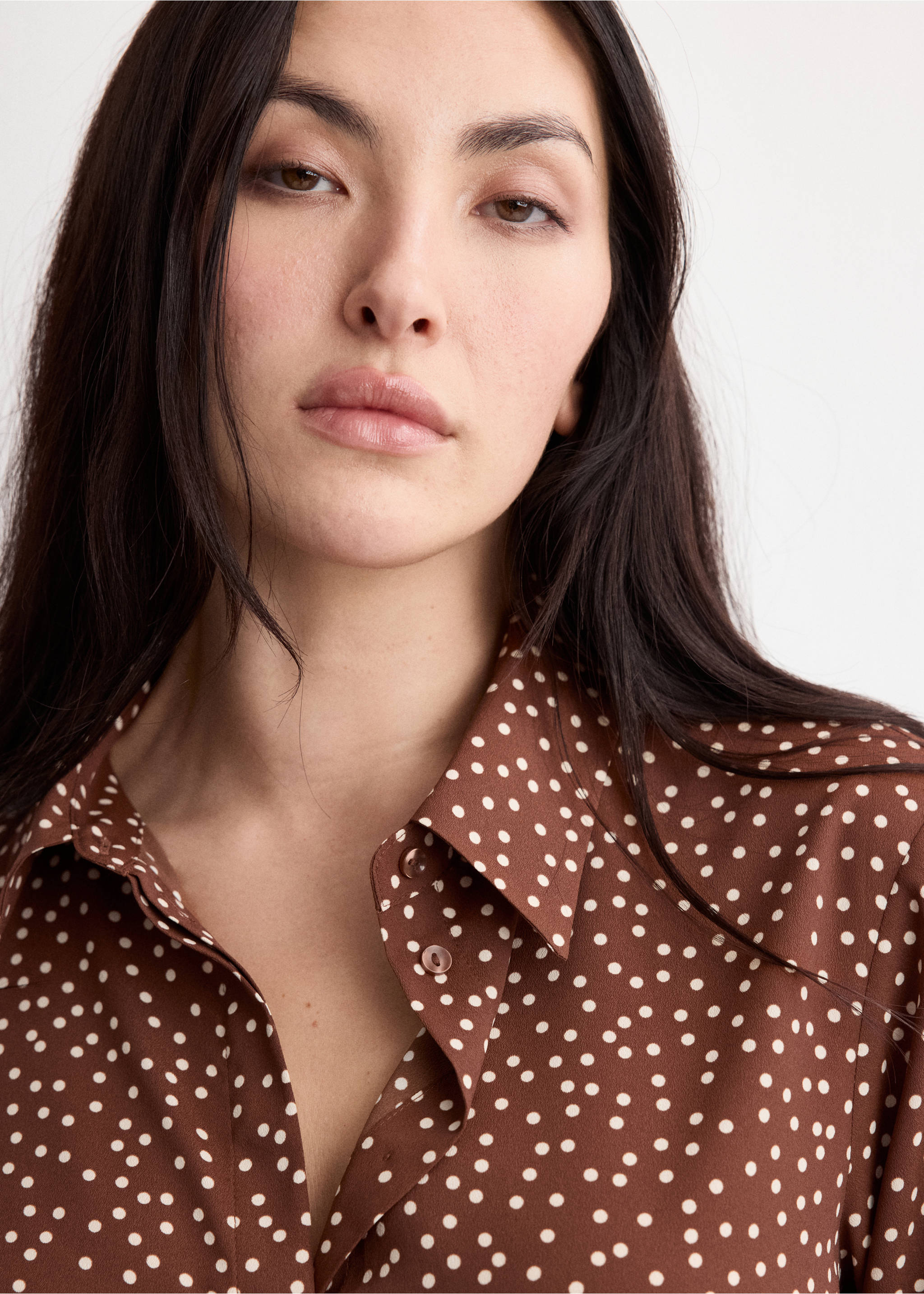 Close-up of a brown polka-dot shirt with a classic collar., Tobacco Brown. Ref: 27051236-00.