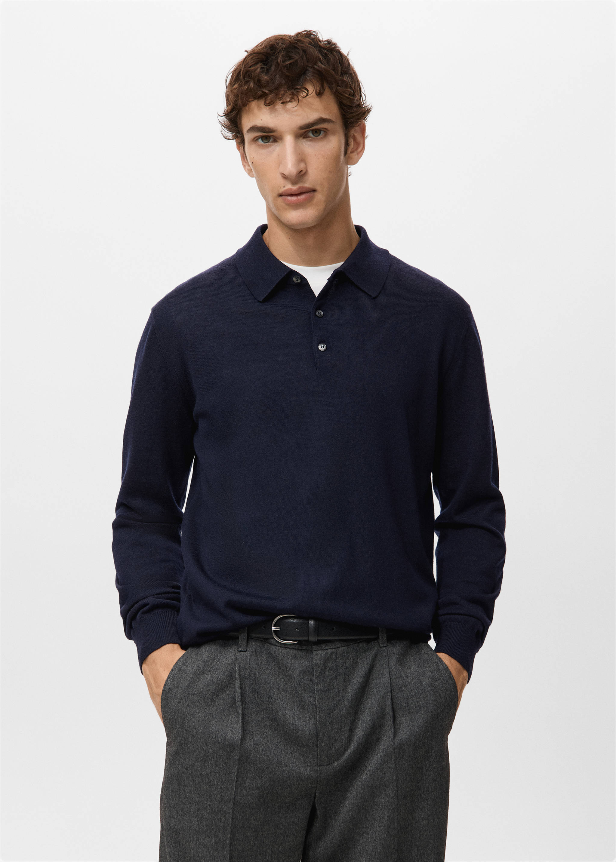 Navy blue long-sleeved knit polo shirt with a classic collar and button placket., Navy. Ref: 27051283-00.