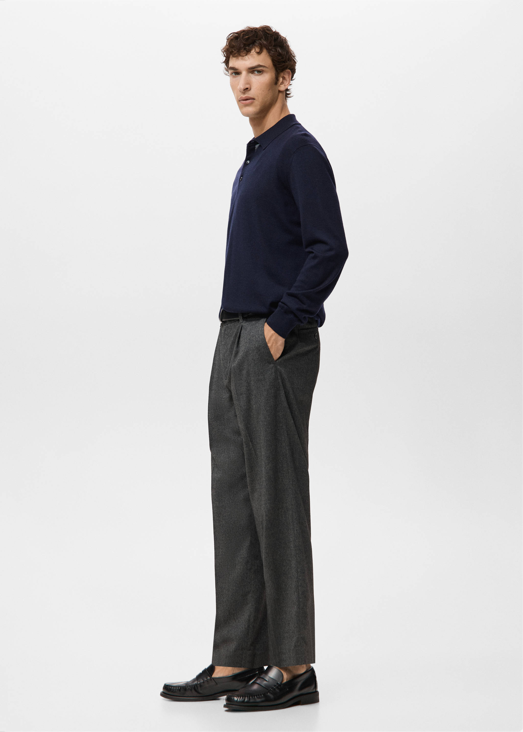 Navy blue long-sleeved polo shirt with a classic collar and button placket.