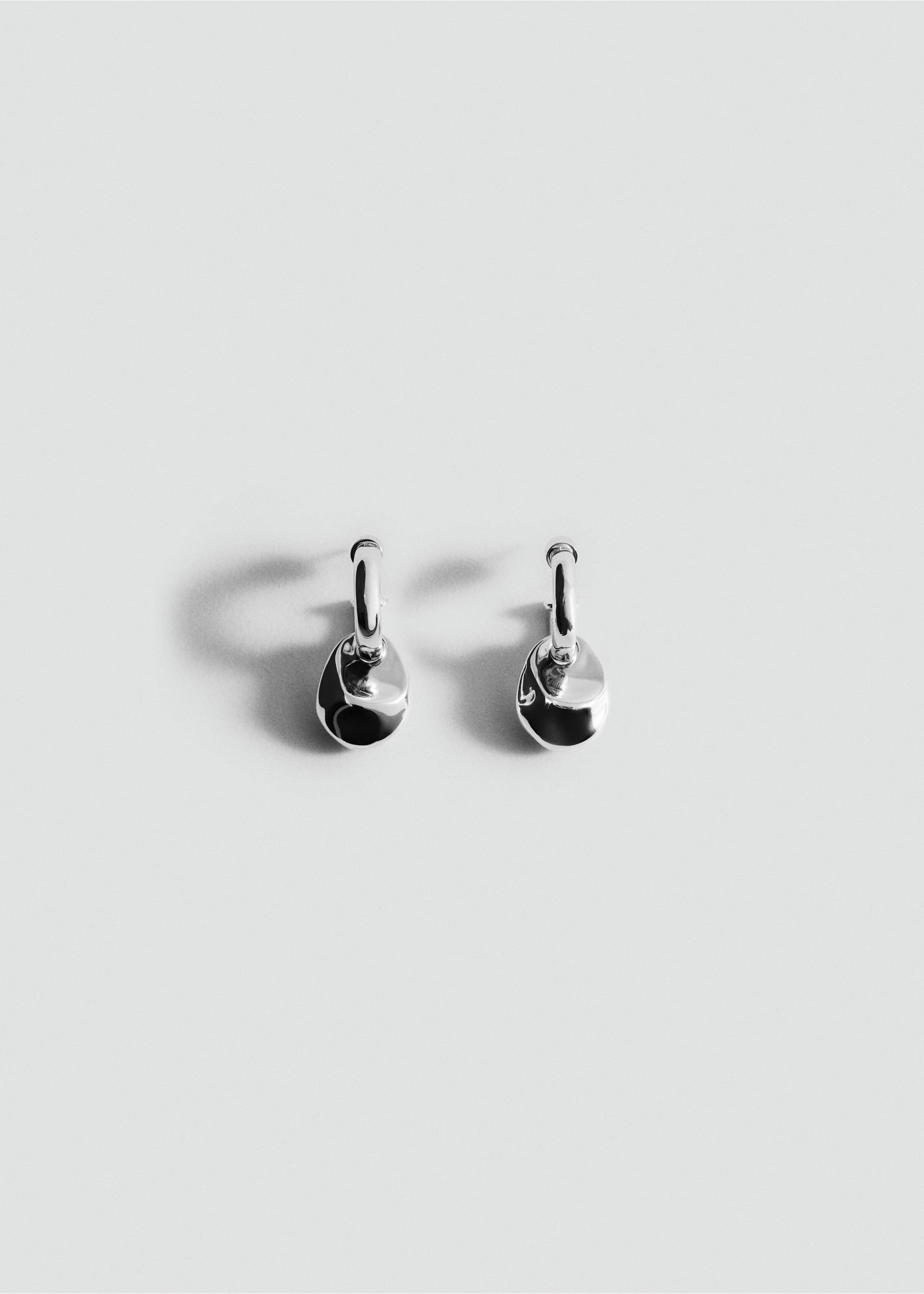 Shiny silver-toned hoop earrings with irregular organic pendants., Silver. Ref: 27052927-00.