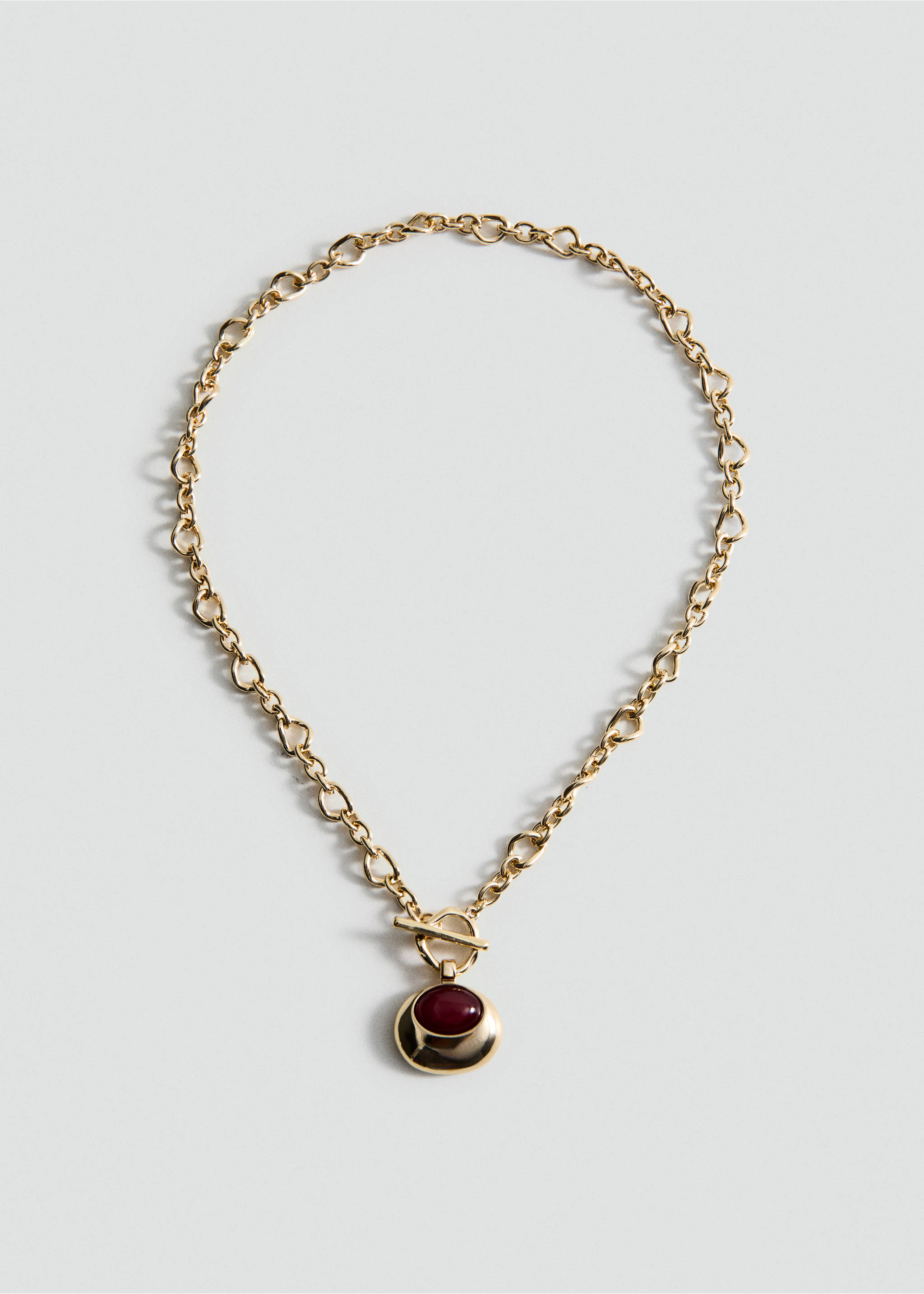 Gold-tone chain necklace with a T-bar clasp and a round red stone pendant., Gold. Ref: 27052930-00.
