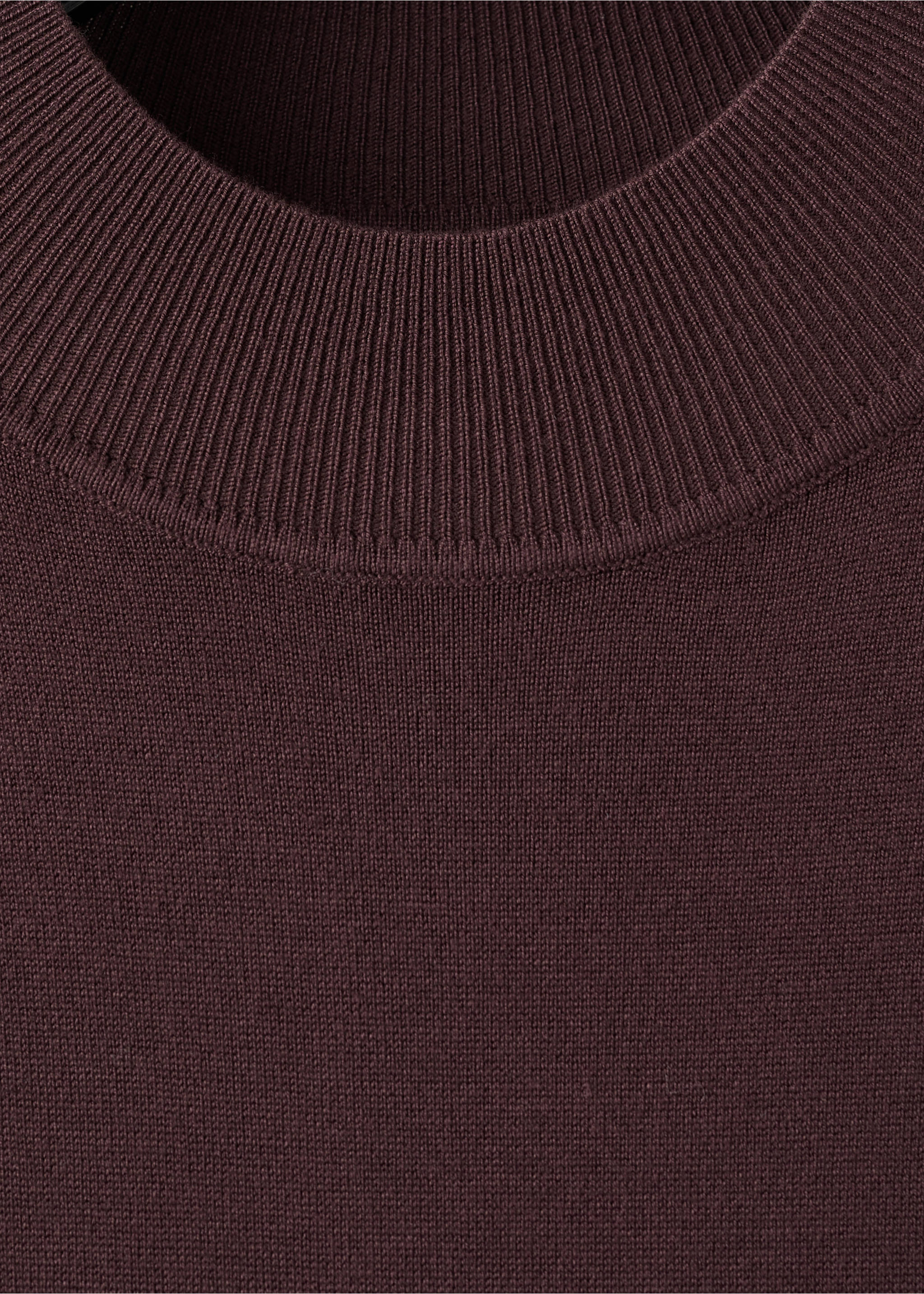 Dark burgundy knit dress detail focusing on the high ribbed neckline., Chocolate. Ref: 27054084-00.