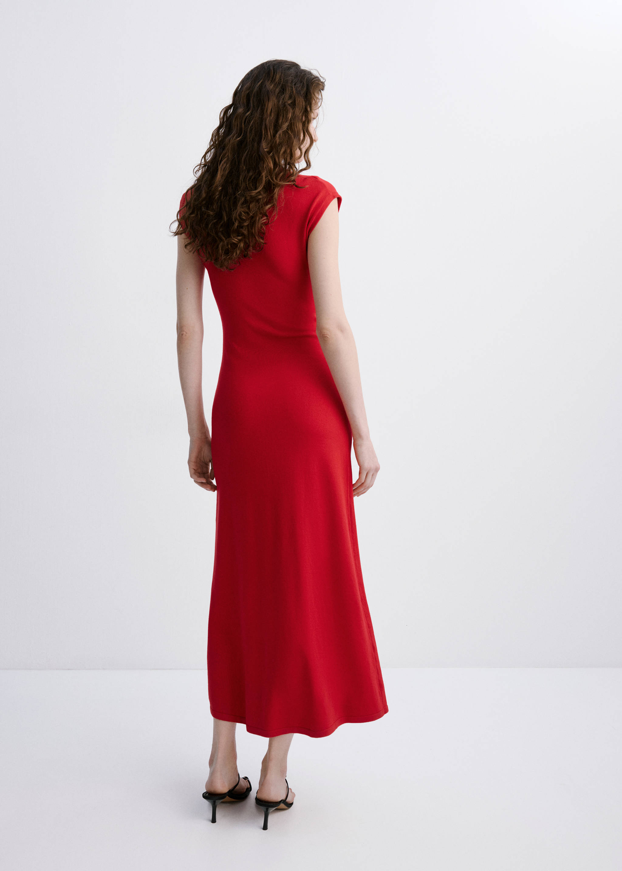 Red midi dress shown from the back, with short cap sleeves and a fitted silhouette.