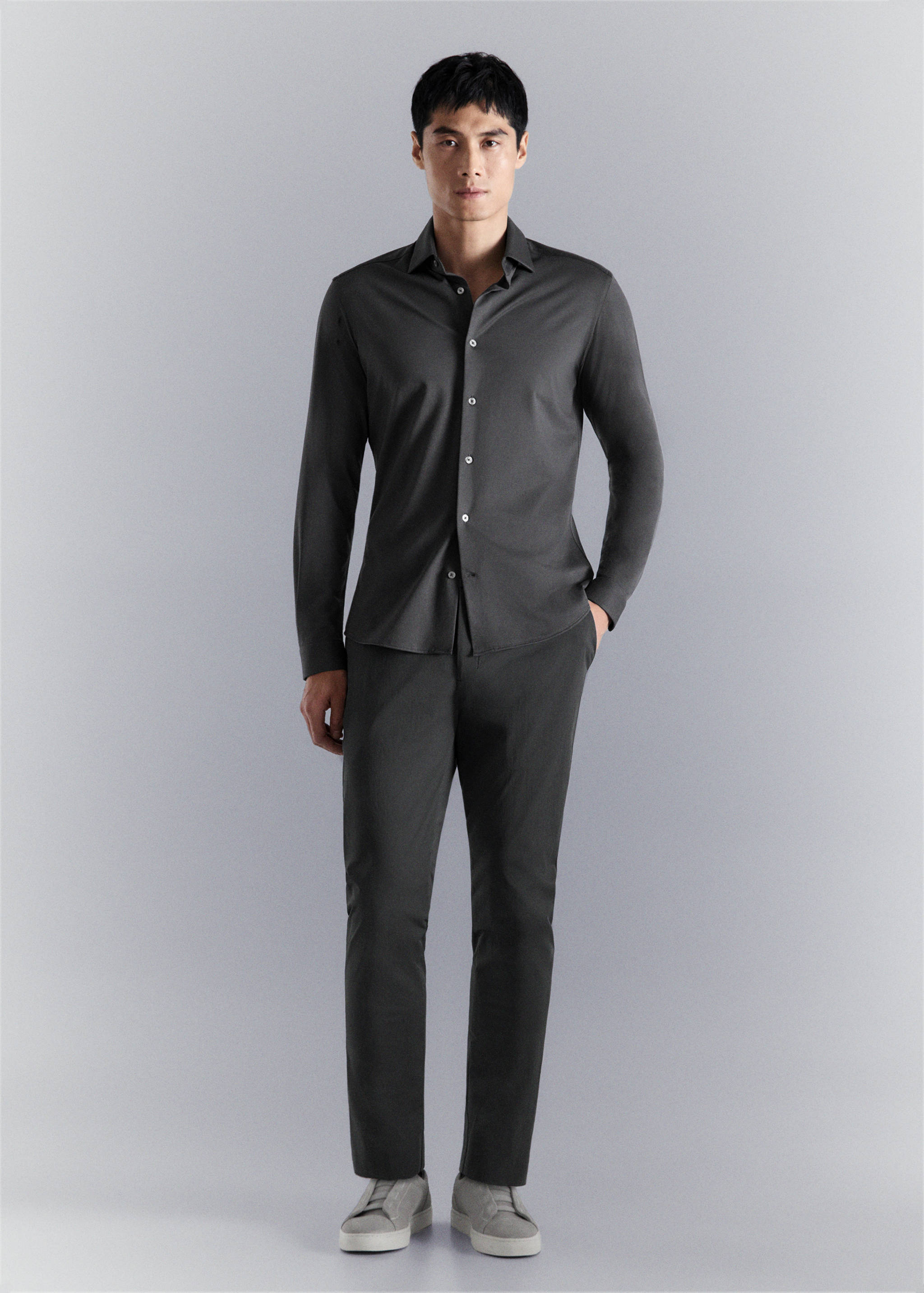 Dark grey long-sleeve shirt with a classic collar and front buttons.