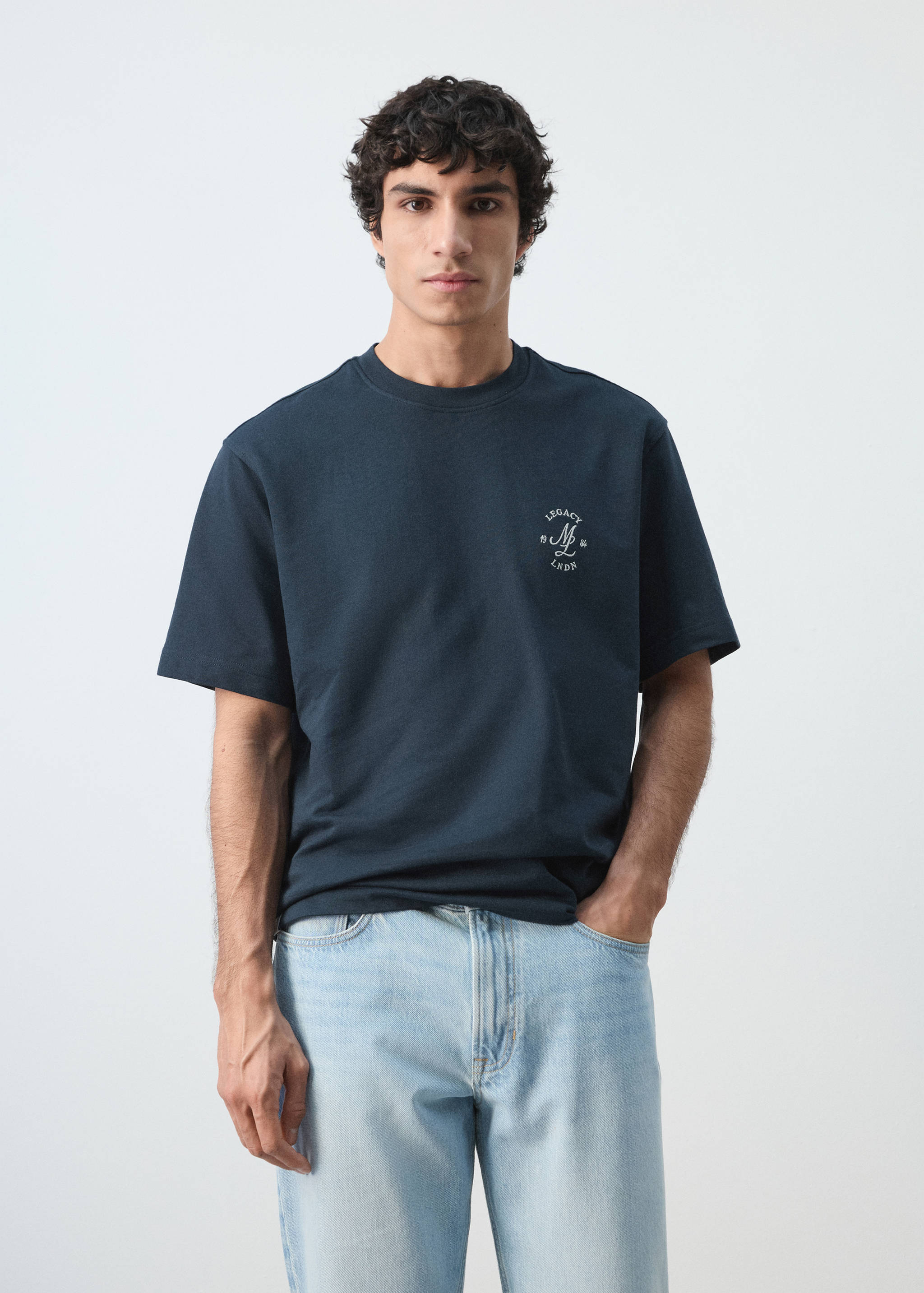 Navy blue relaxed fit short-sleeve t-shirt with a crew neck and small chest print.
