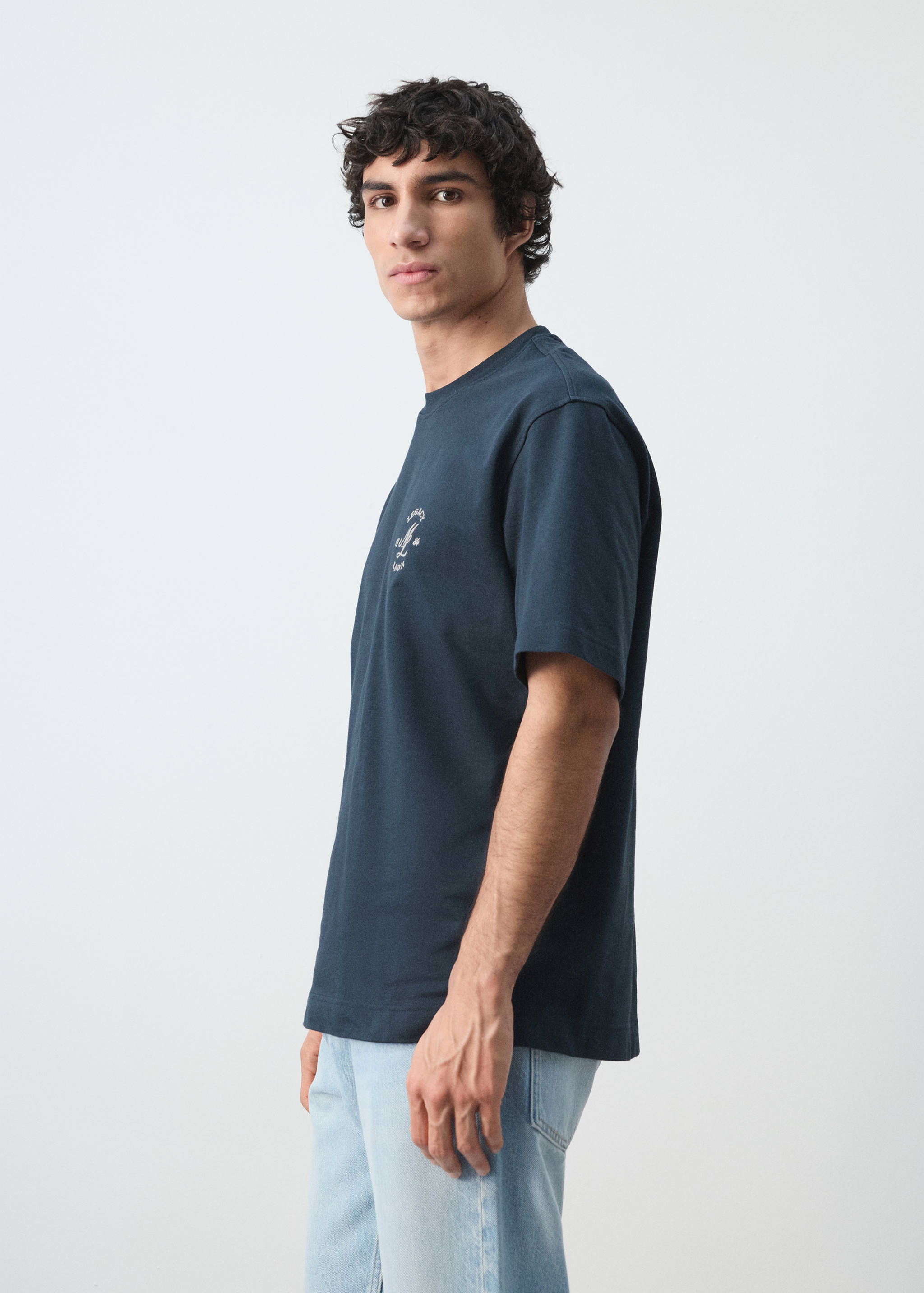 Navy blue crew-neck t-shirt with short sleeves and a small chest print.