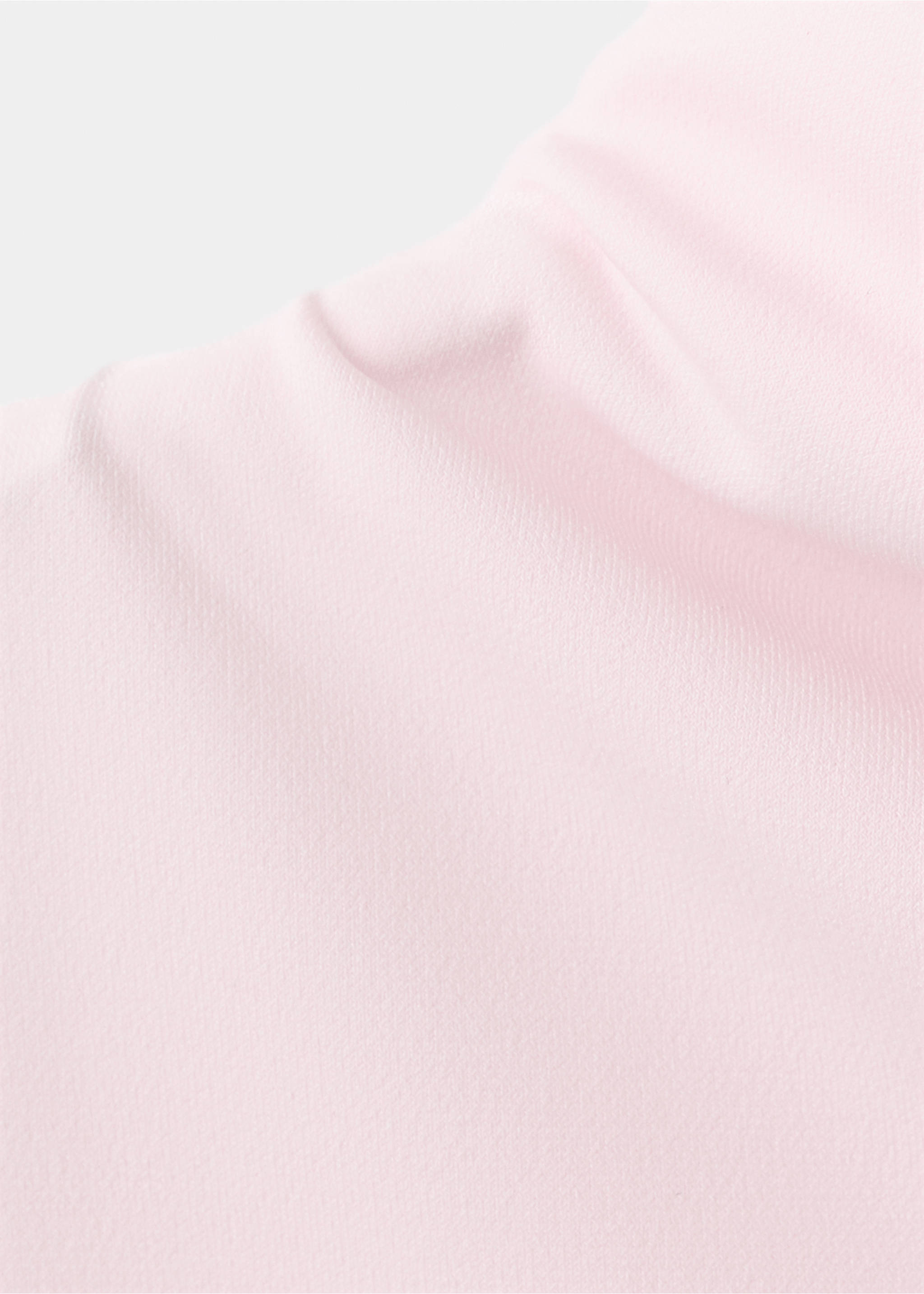 Primer plano del detalle de tejido en rosa claro de un top., Rosa palo. Ref: 27055826-00.
