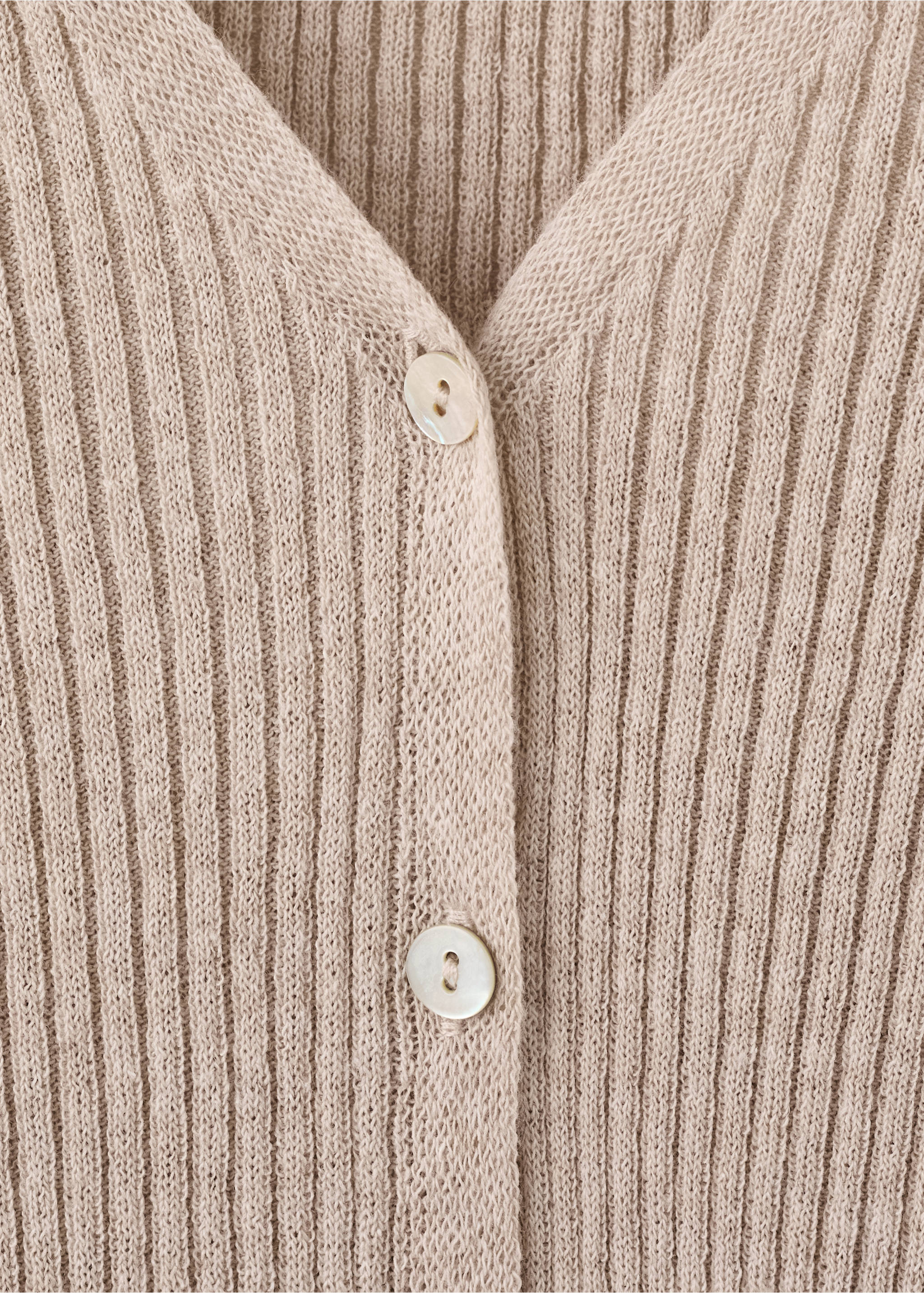 Close-up of a beige ribbed knit cardigan with a V-neck and buttons., Sand. Ref: 27055840-00.