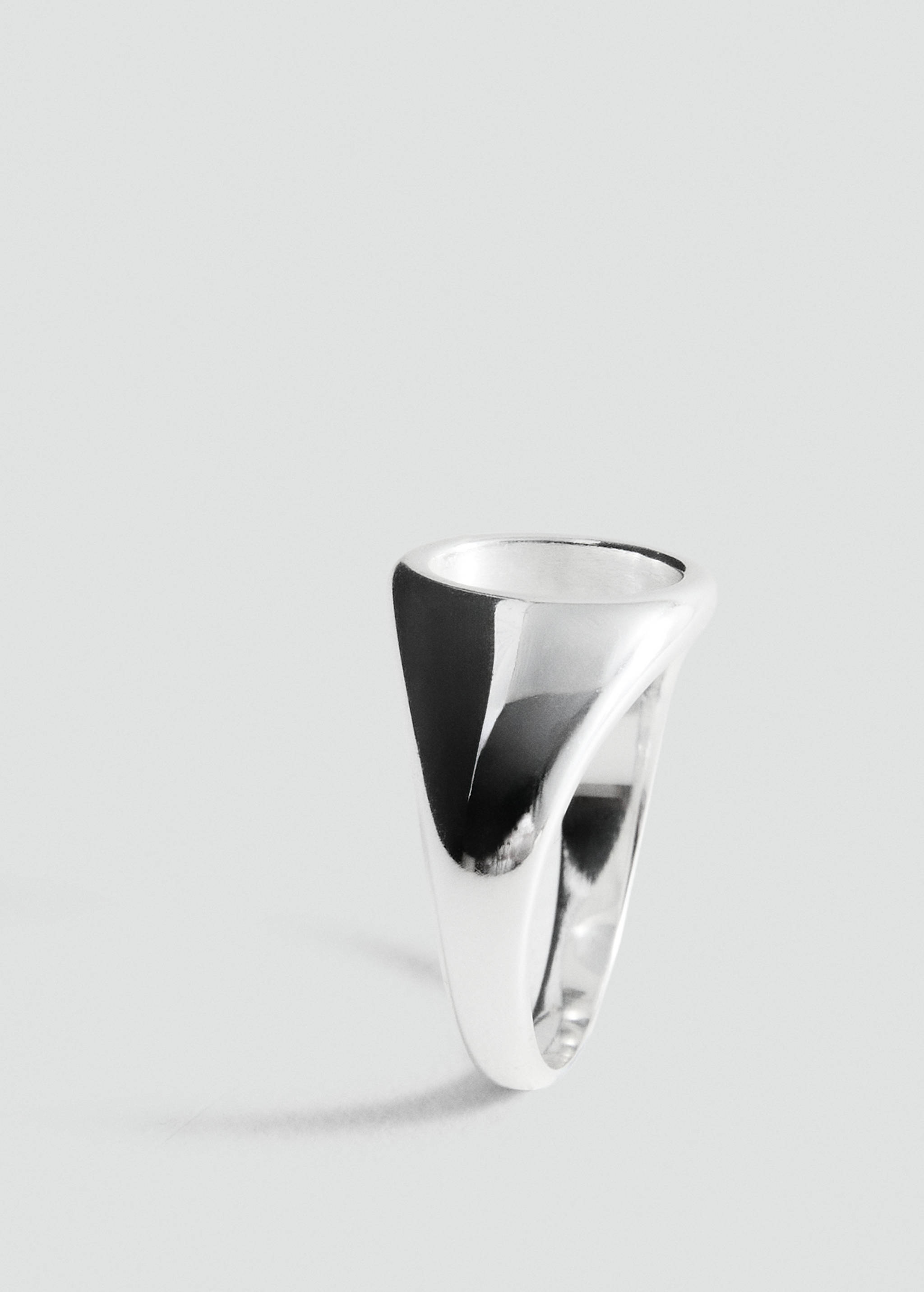 Polished silver-finish ring with a chunky tapered band.