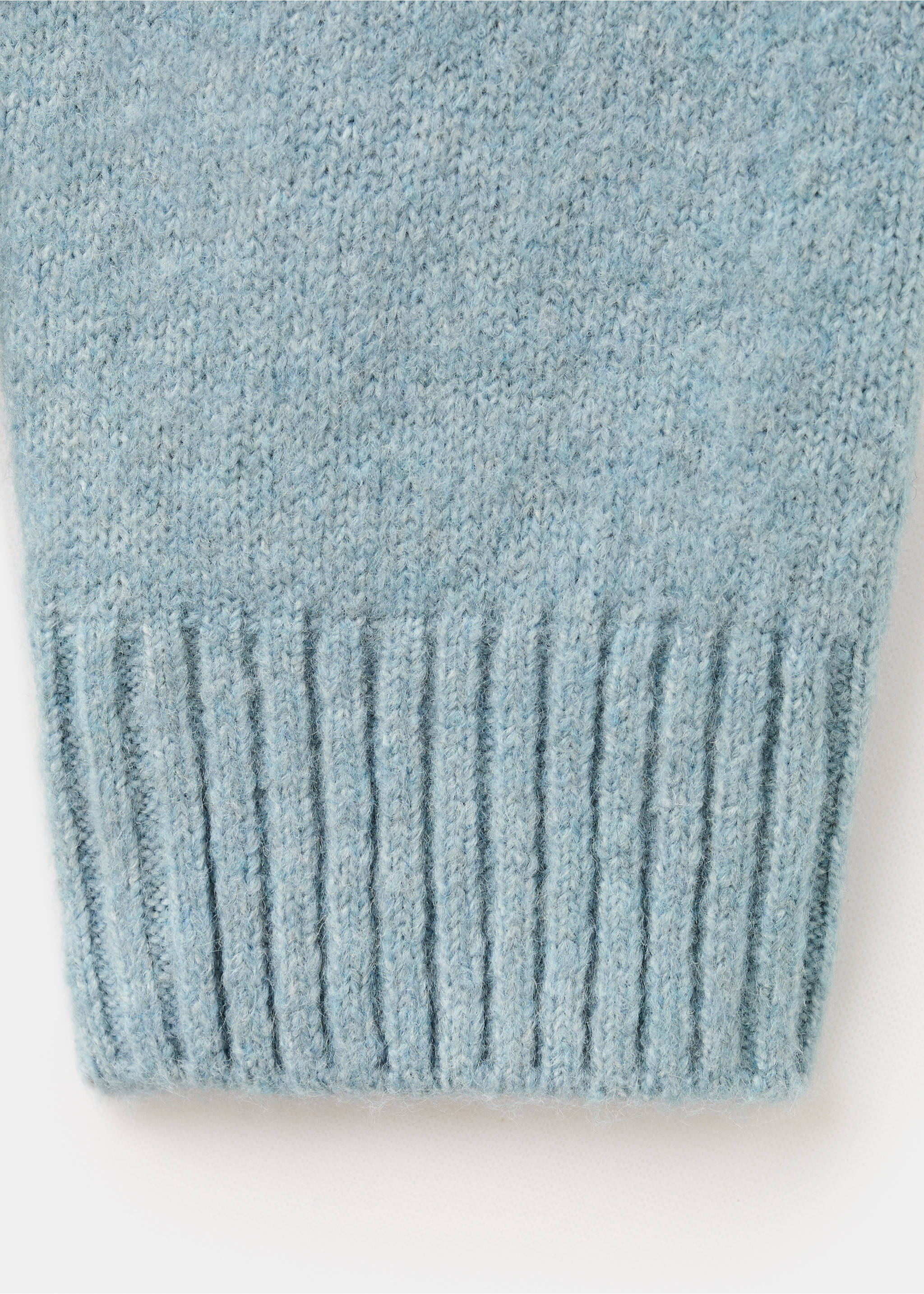 Close-up of the knit texture and ribbed cuff on a light blue jumper., Aqua Green. Ref: 27061179-00.