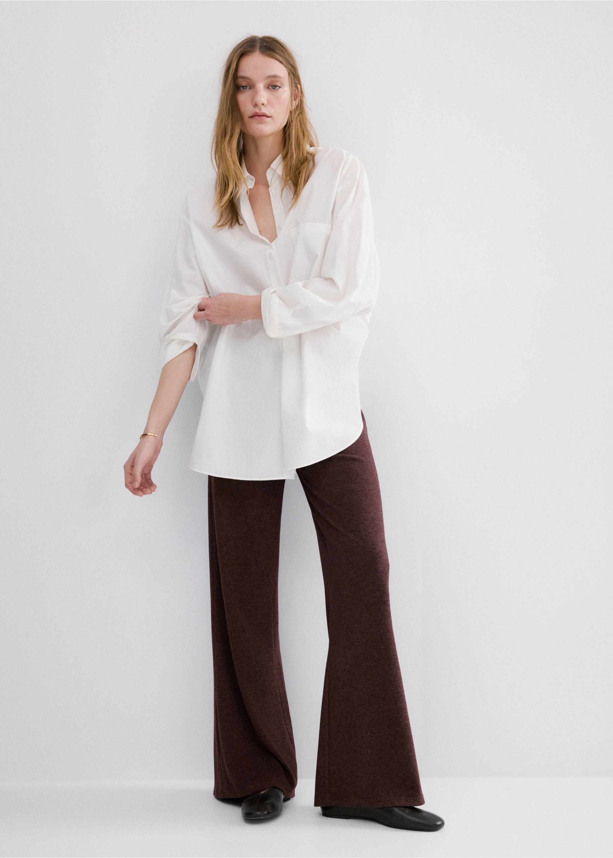 Knitted trousers with elastic waistband - Details of the article 2, Burgundy. Ref: 27061252-00.