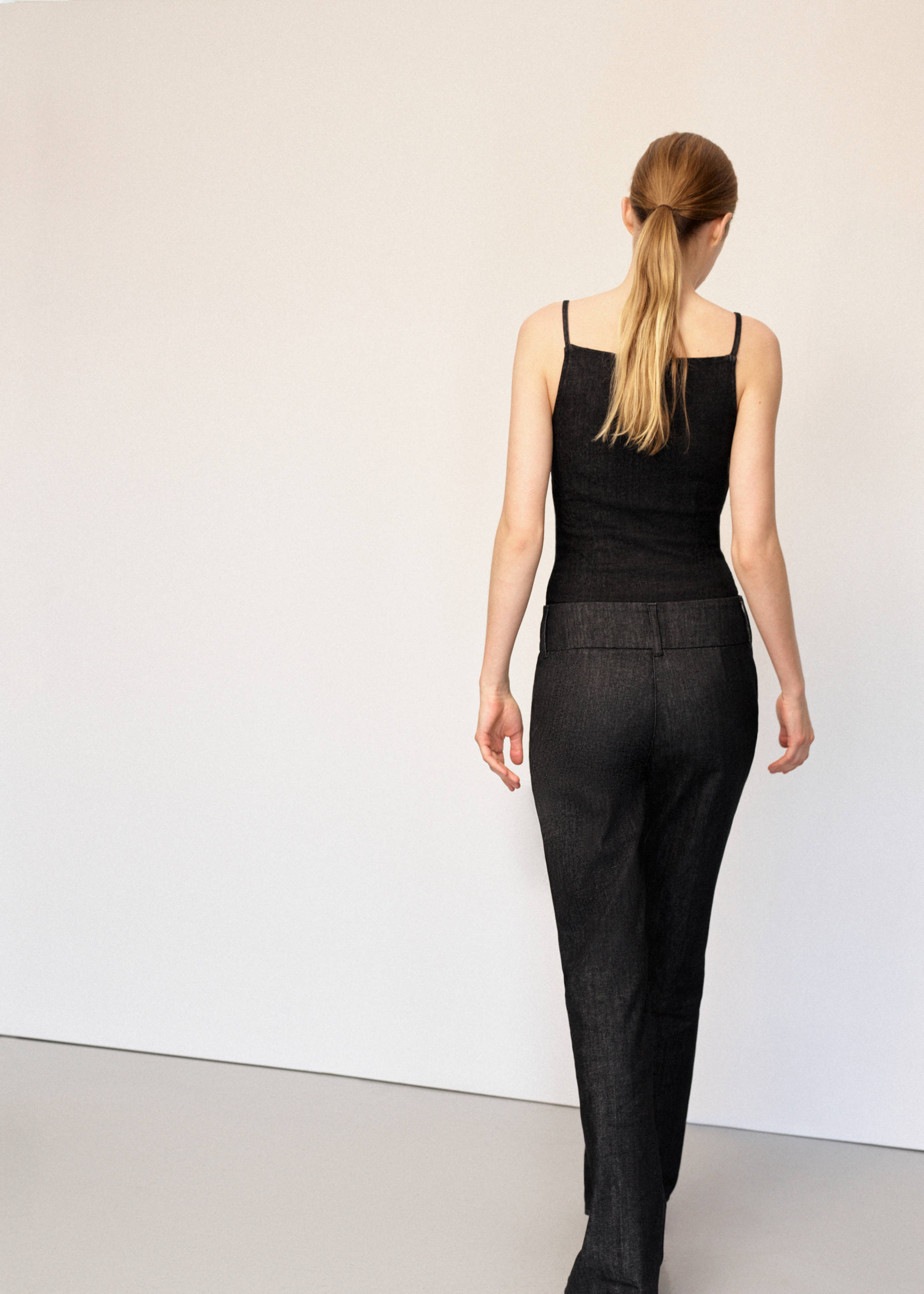 Dark denim trousers in a straight-leg fit, shown from the back., Black. Ref: 27063329-00.