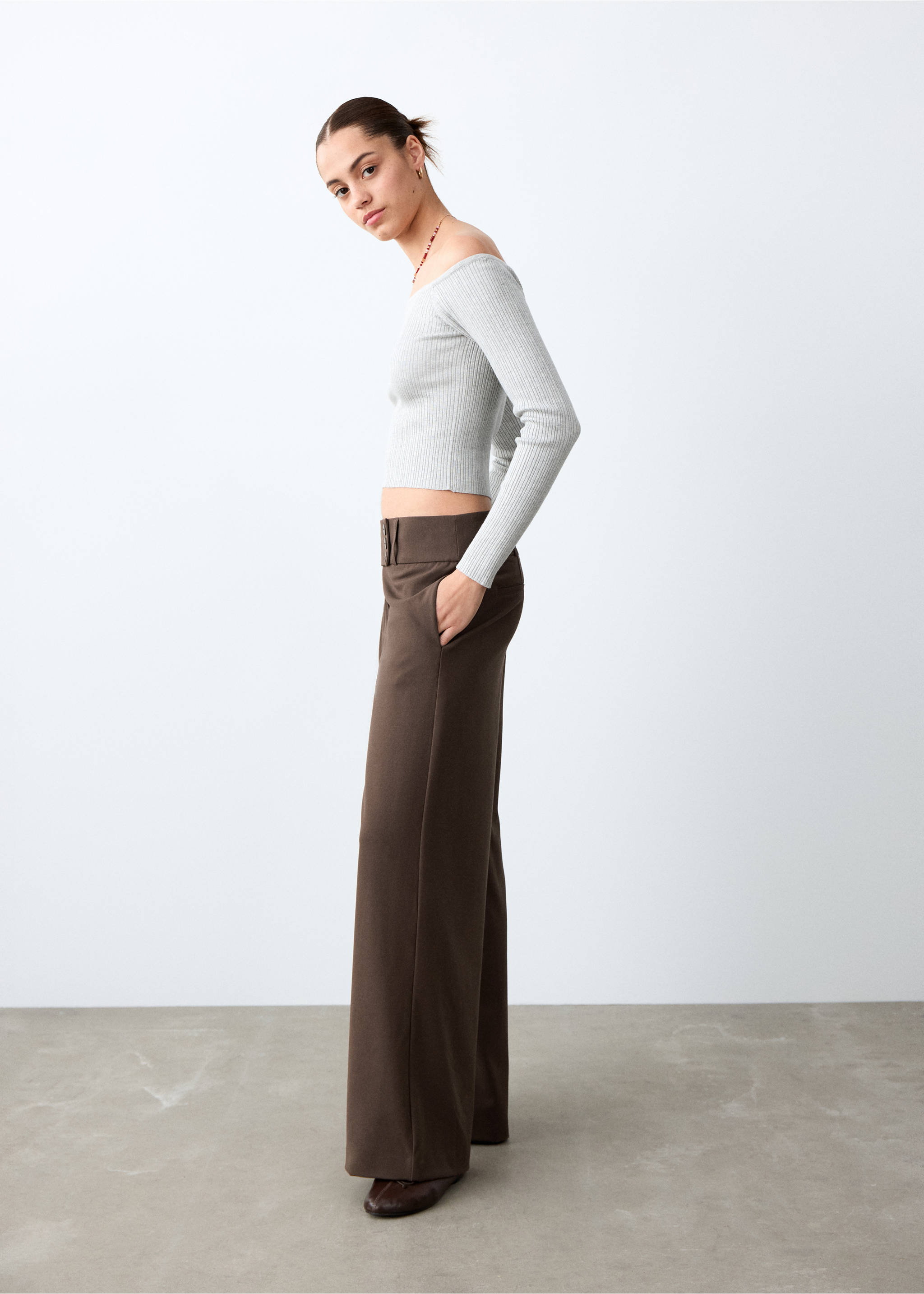 Brown wide-leg trousers with a buttoned waistband, worn with a grey ribbed off-the-shoulder top., Brown. Ref: 27071539-00.