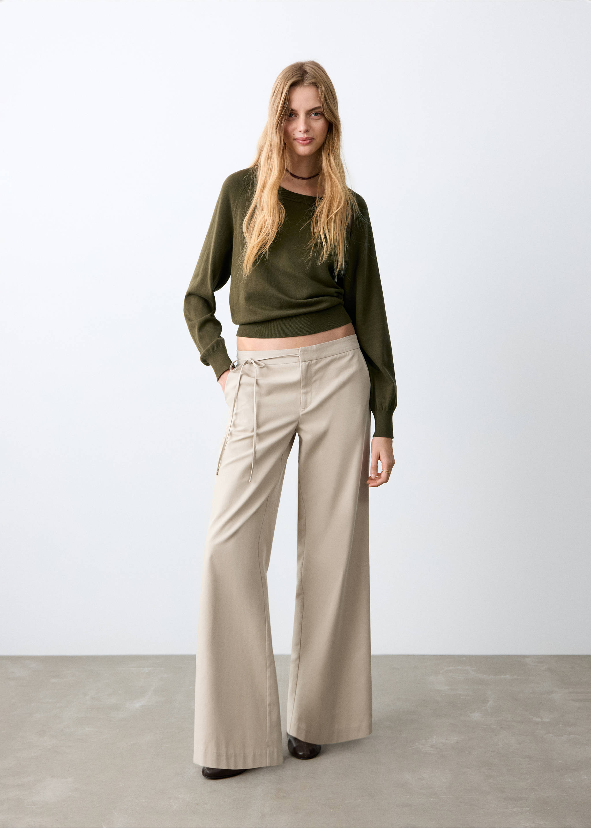 Beige wide-leg trousers with thin side ties, styled with an olive green jumper., Beige. Ref: 27072549-00.
