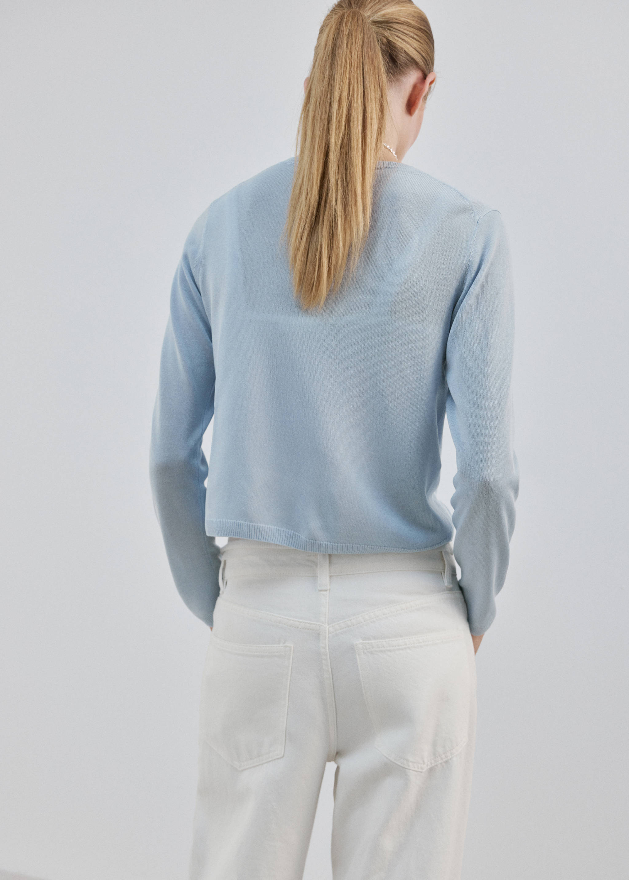 Light blue fine-knit cardigan, back view