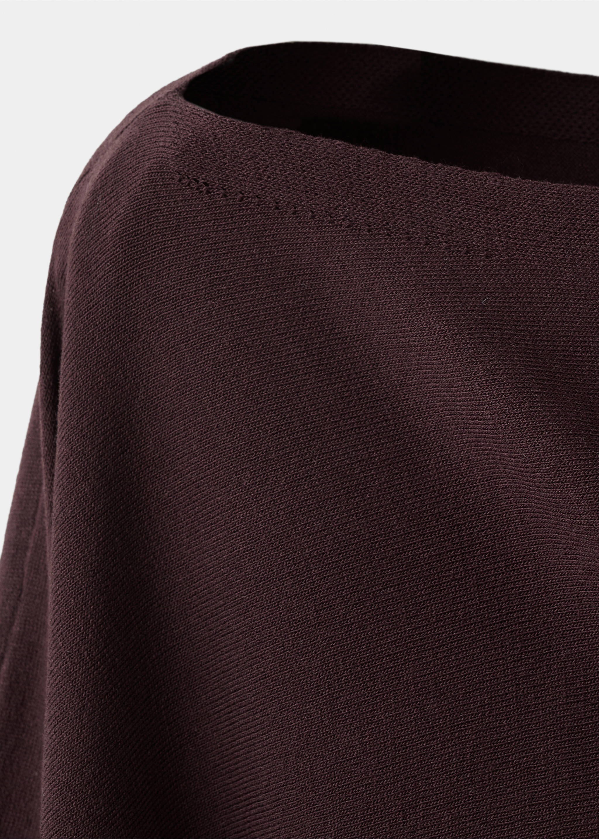 Close-up of a dark burgundy knit cape showing the boat neckline., Wine. Ref: 27075826-00.