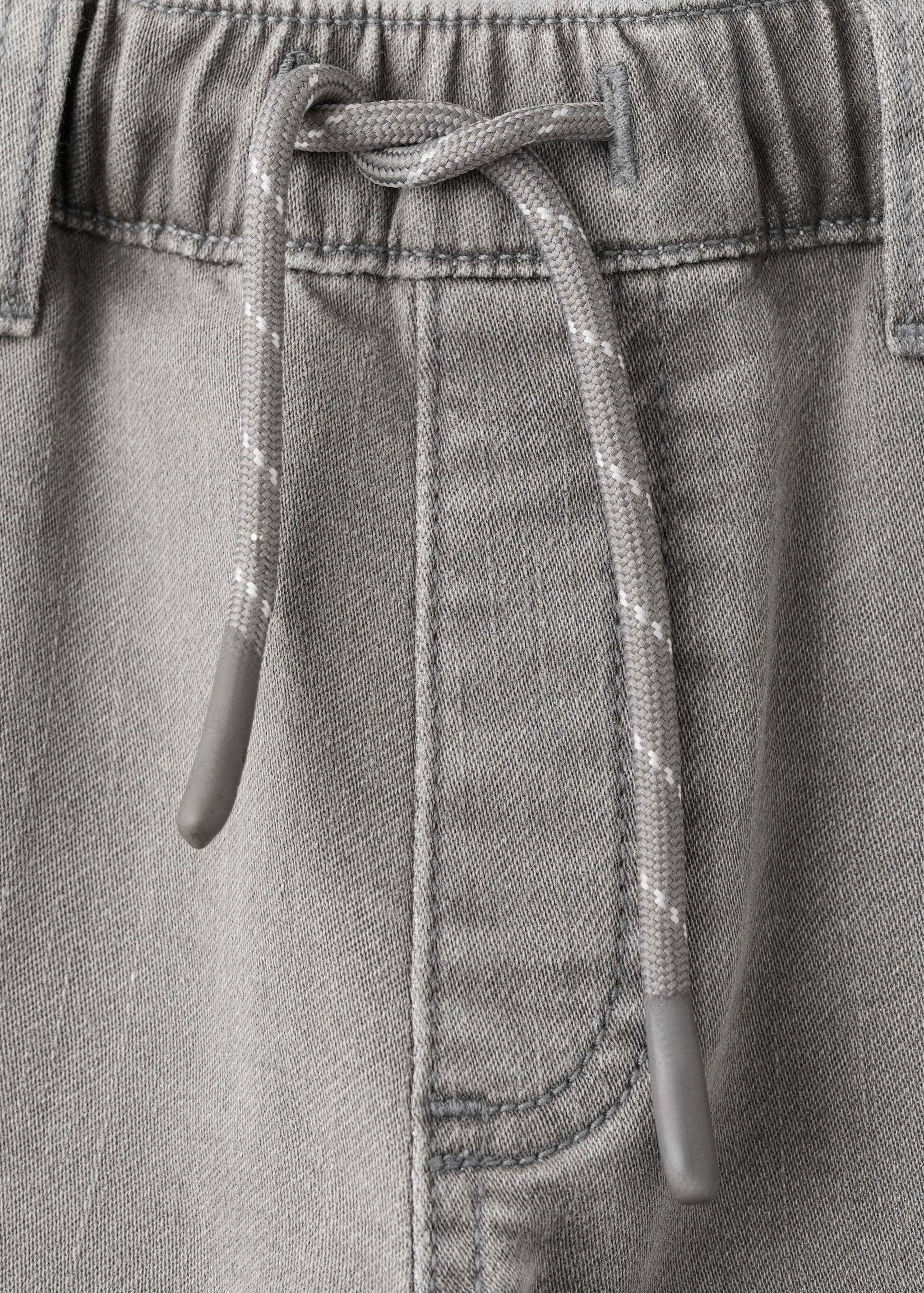 Bequeme Jeans mit Kordelzug - Detail des Artikels 8