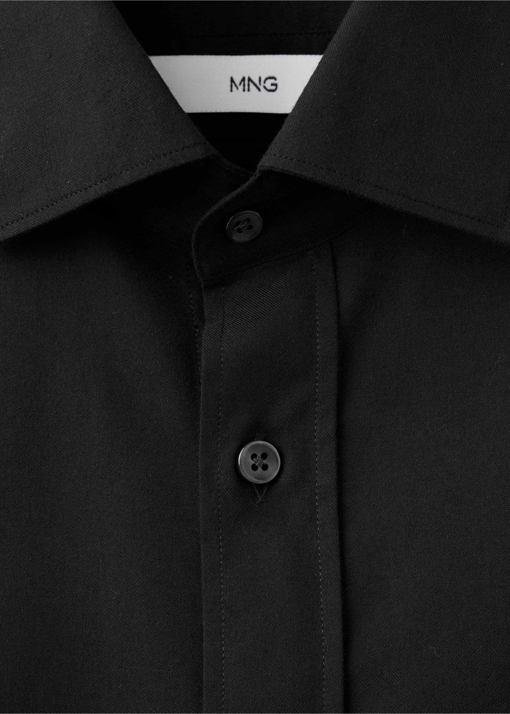 Close-up of a black shirt collar and button placket., Black. Ref: 27081310-00.