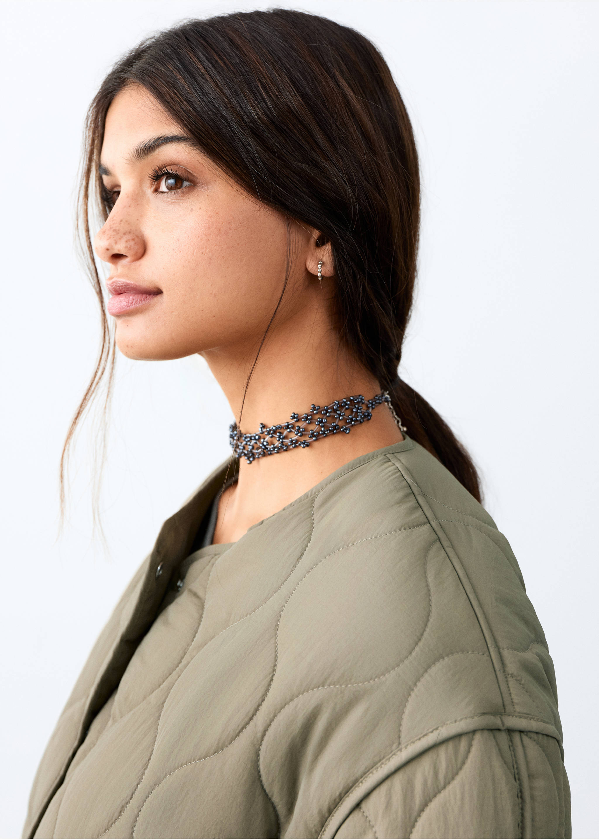 Olive green collarless quilted parka, model detail view, Khaki. Ref: 27084432-00.