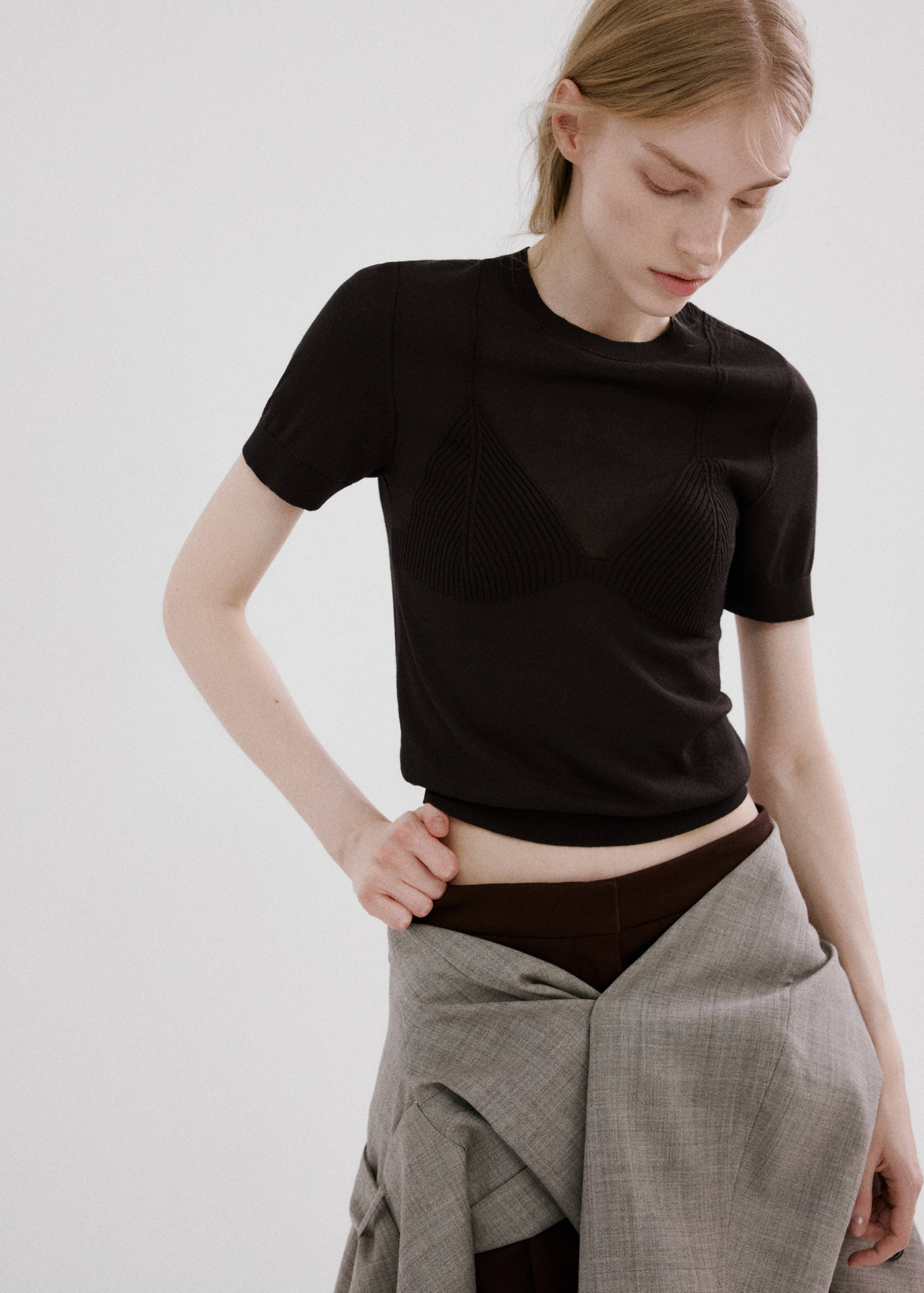 Black short-sleeved fine-knit jersey with a crew neck and ribbed bralette detail.