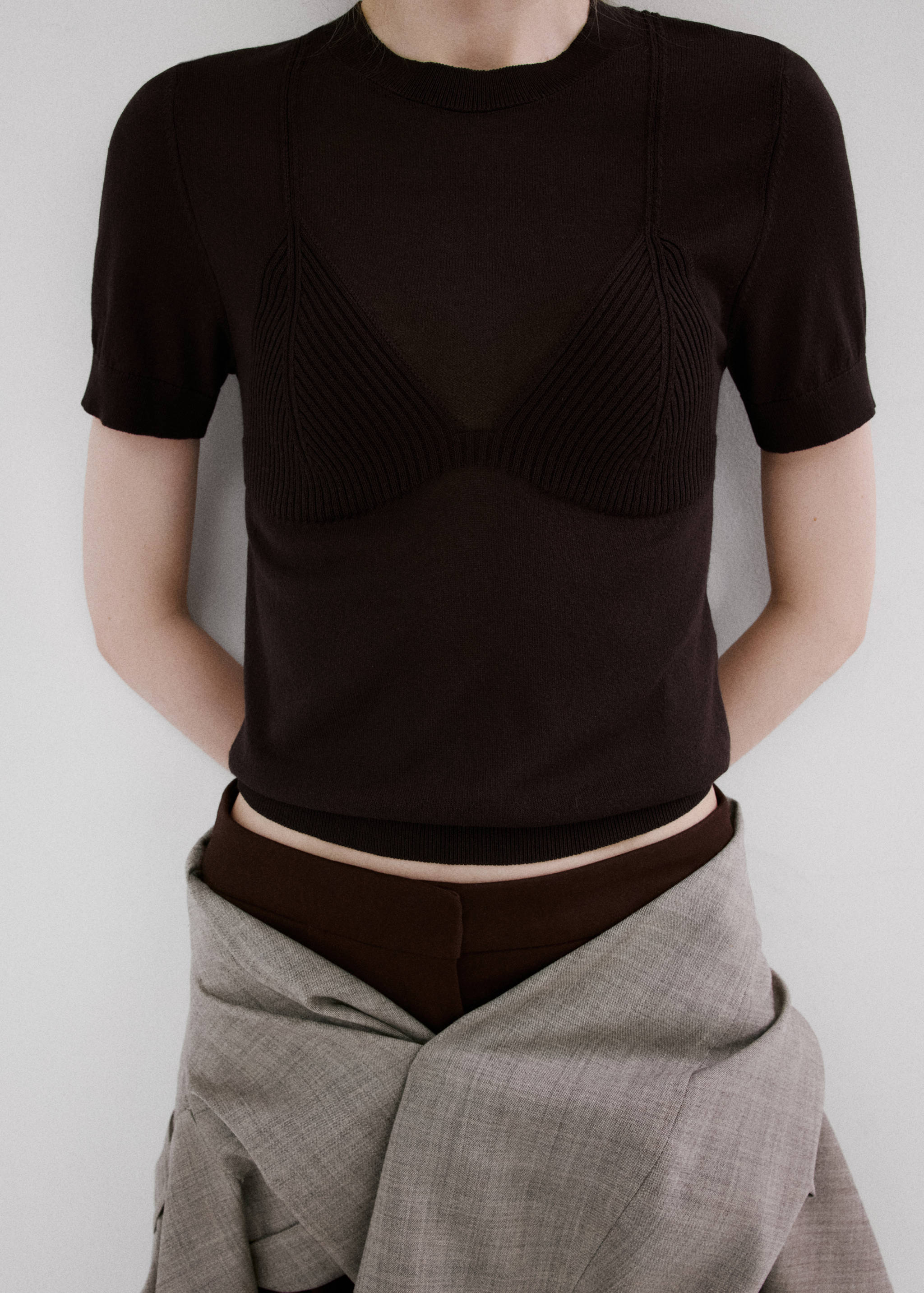 Dark brown short-sleeved knit jersey featuring an integrated ribbed bralette panel detail.