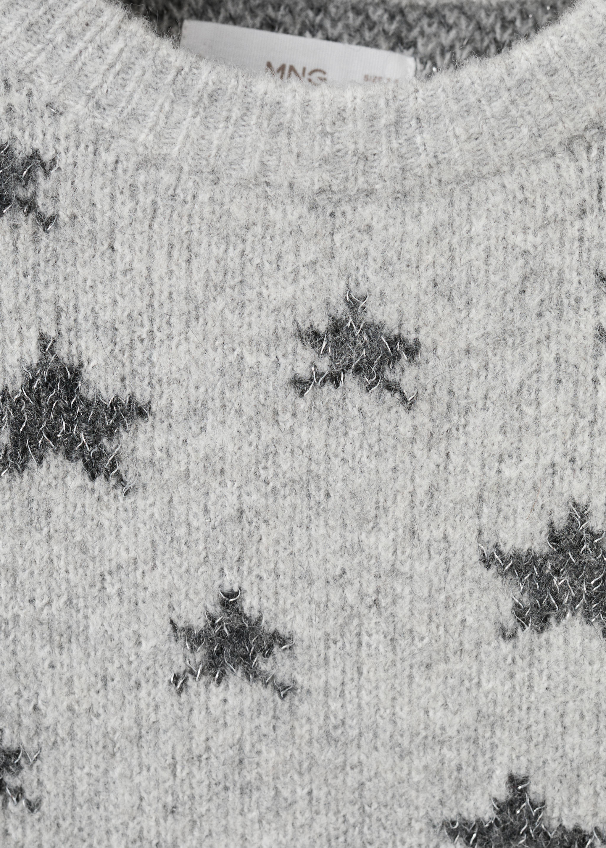 Close-up of a grey knit jersey with dark grey star motifs and a crew neck., Grey. Ref: 27091178-00.