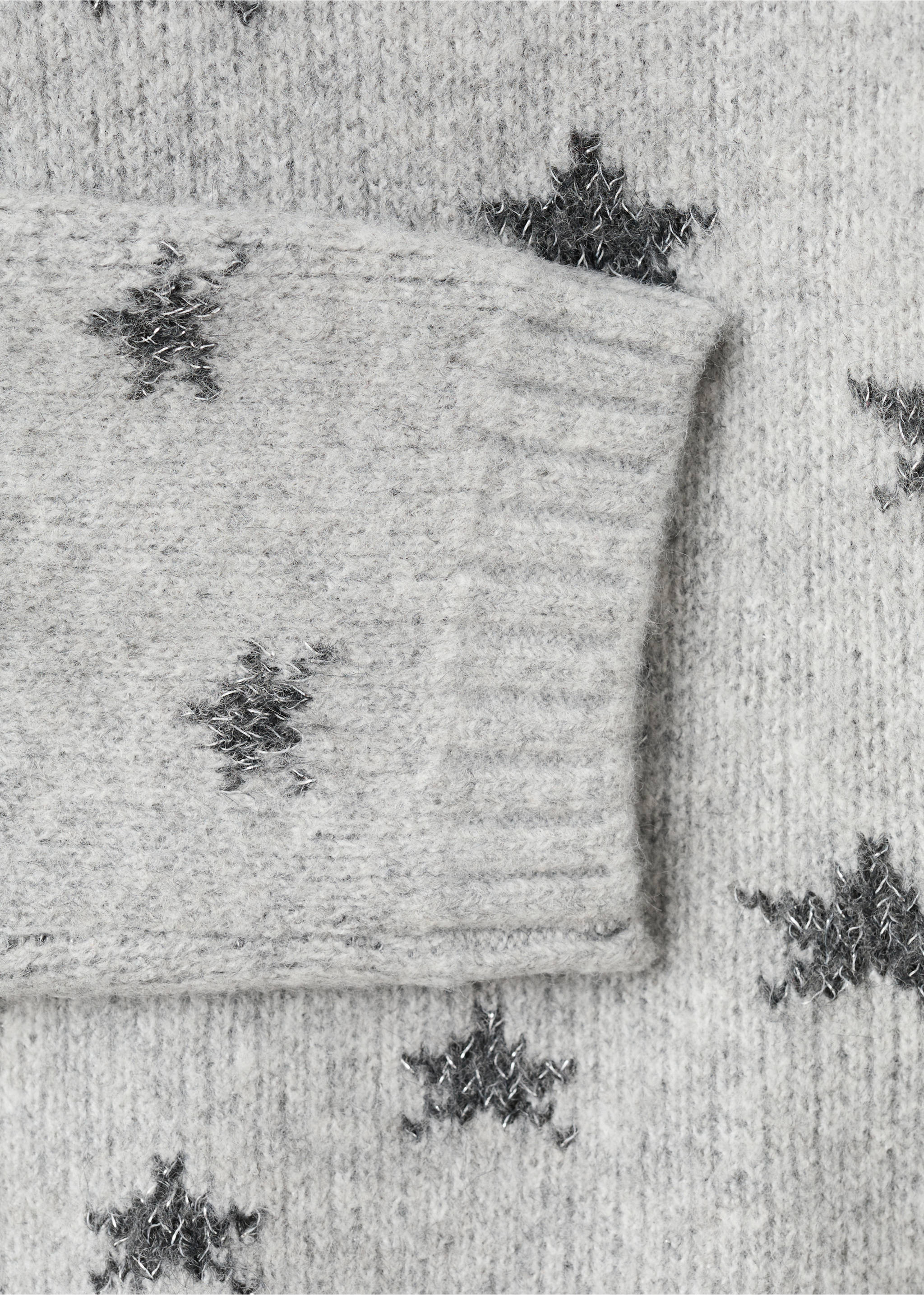 Close-up of a grey knitted jumper with a dark grey metallic star pattern., Grey. Ref: 27091178-00.