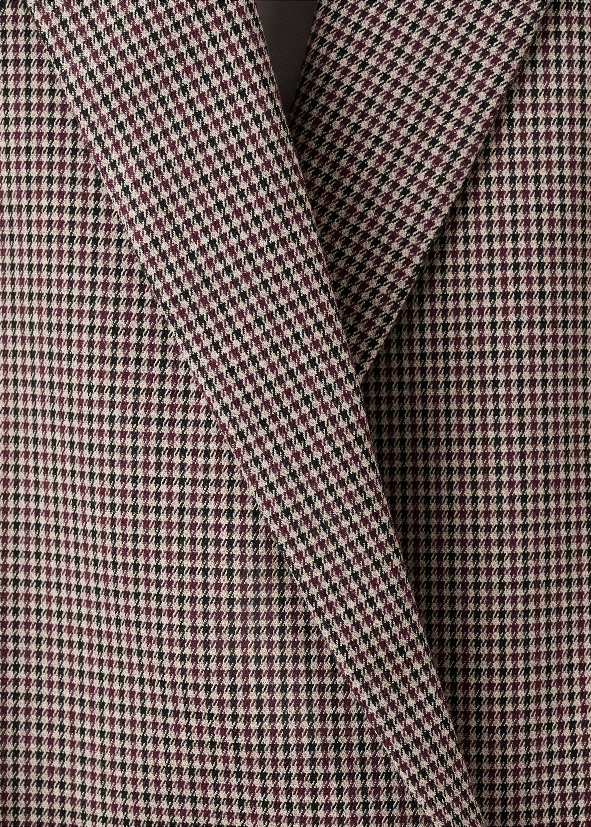 Close-up of burgundy houndstooth blazer fabric and lapel., Burgundy. Ref: 27091259-00.