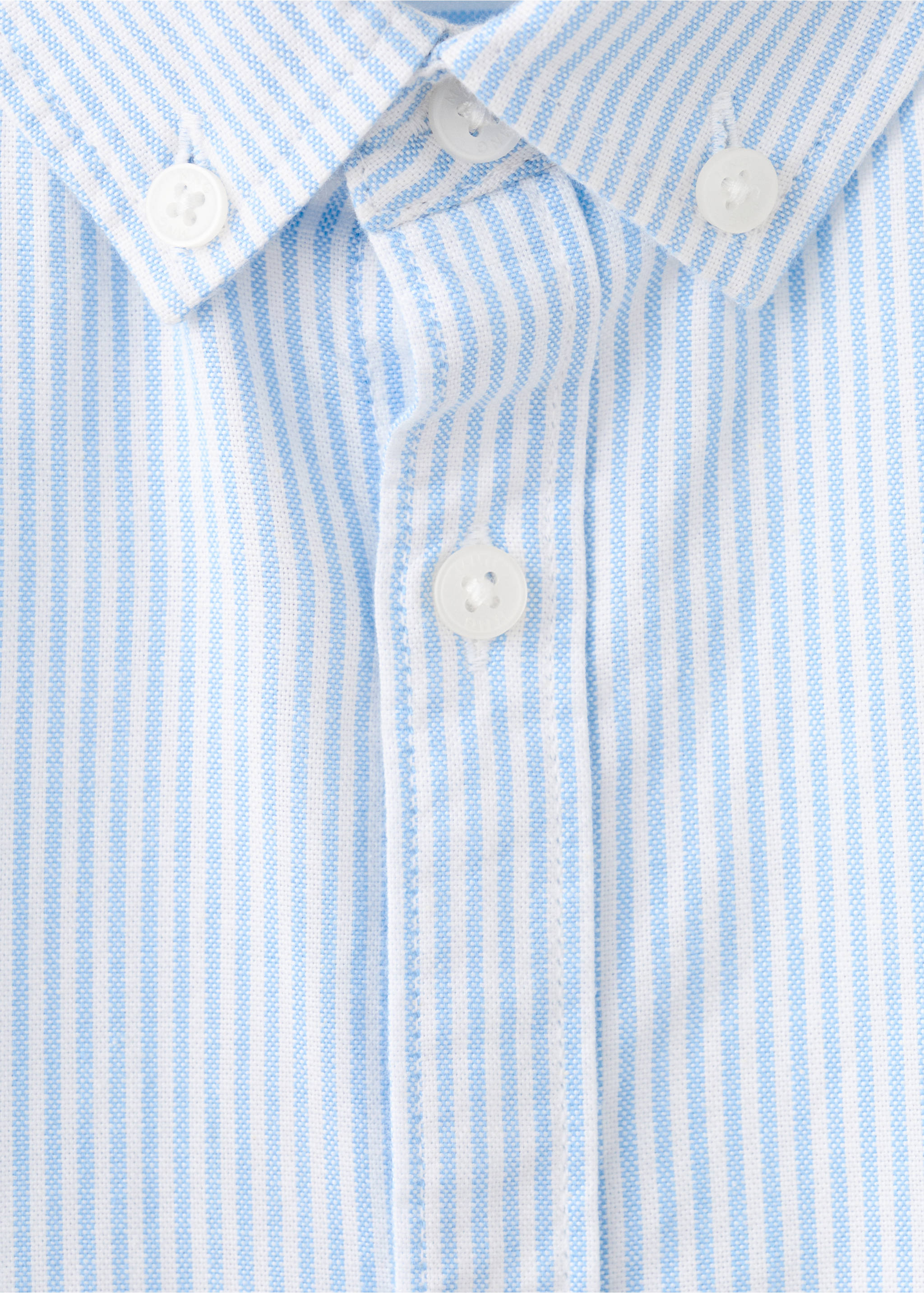 Close-up of a blue and white striped shirt collar and button placket., Sky Blue. Ref: 27091265-00.