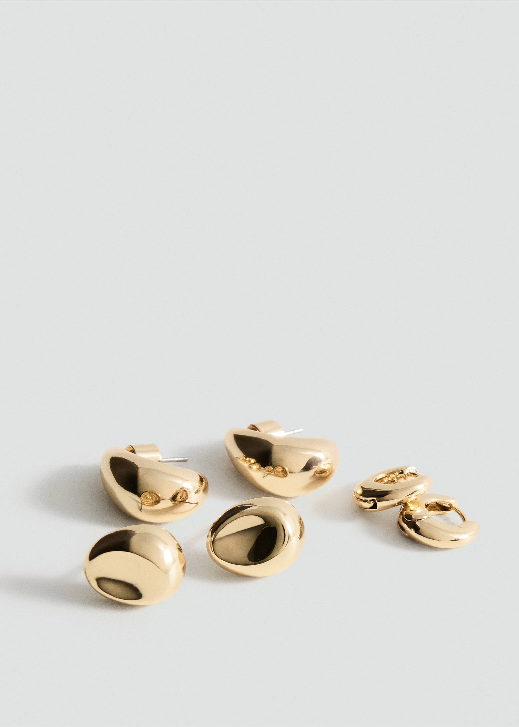 Set of five polished gold-finish metallic earrings in organic and hoop shapes., Gold. Ref: 27091277-00.