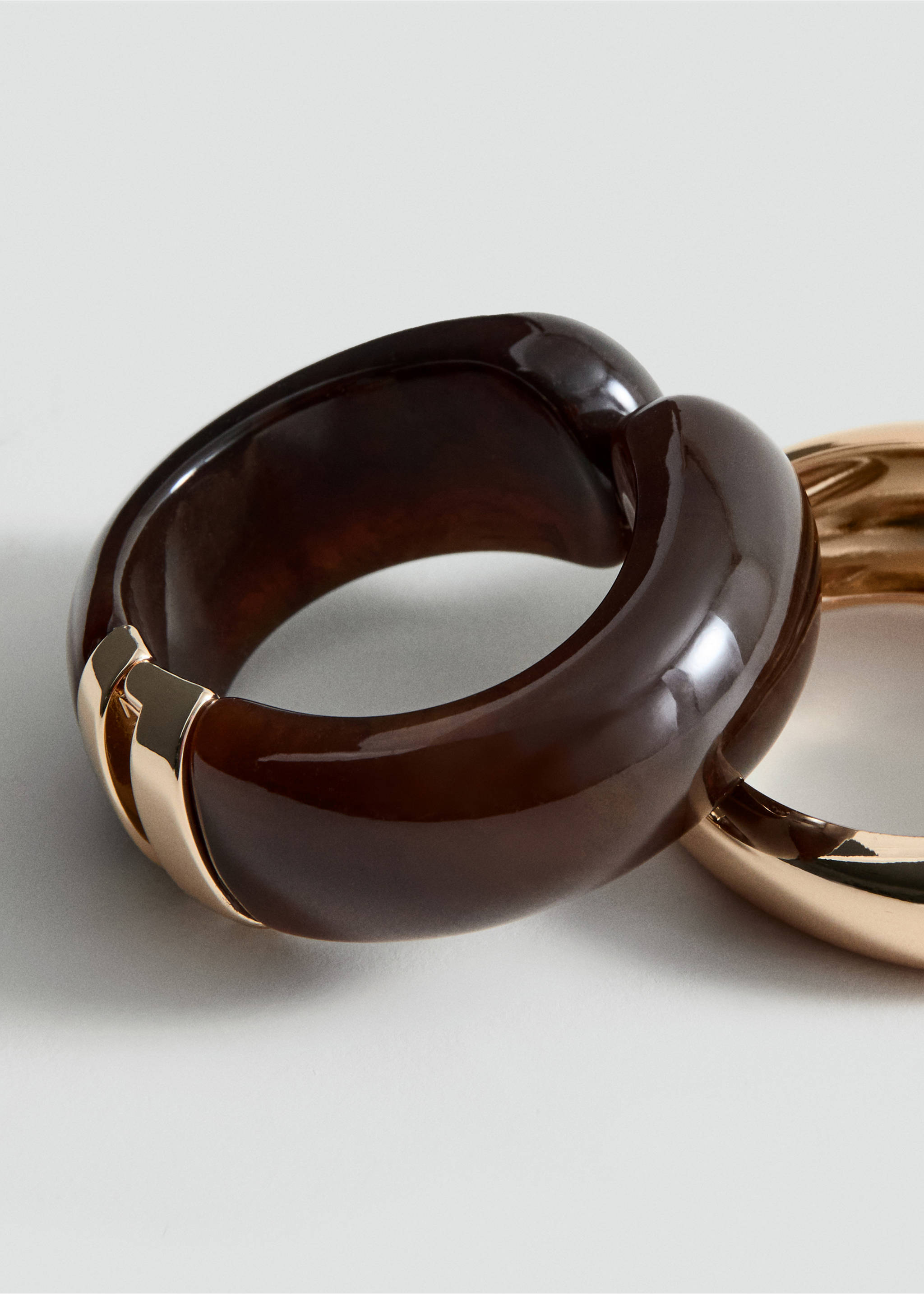 Thick dark brown resin bracelet with a gold-toned metal hinge., Gold. Ref: 27092922-00.