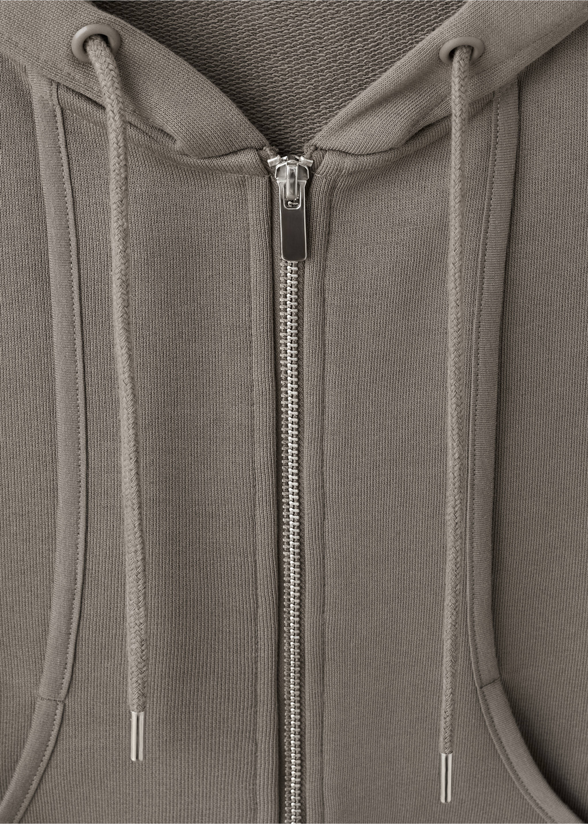 Taupe-grey zip-up sweatshirt detail featuring a hood, metal zip, and drawstrings., Grey. Ref: 27093730-00.