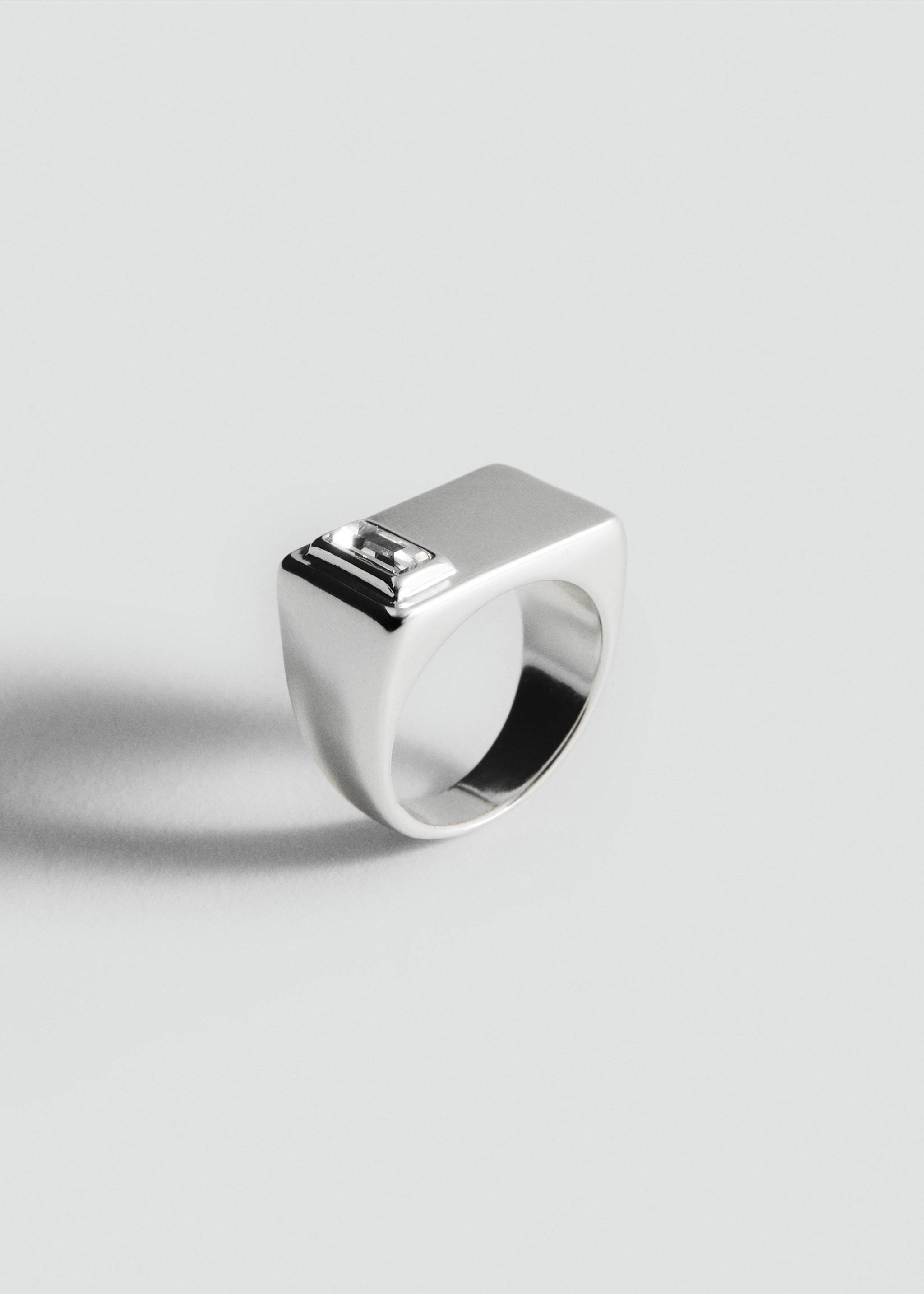 Silver-toned chunky ring with a polished flat top and a single rectangular stone., Silver. Ref: 27097788-00.