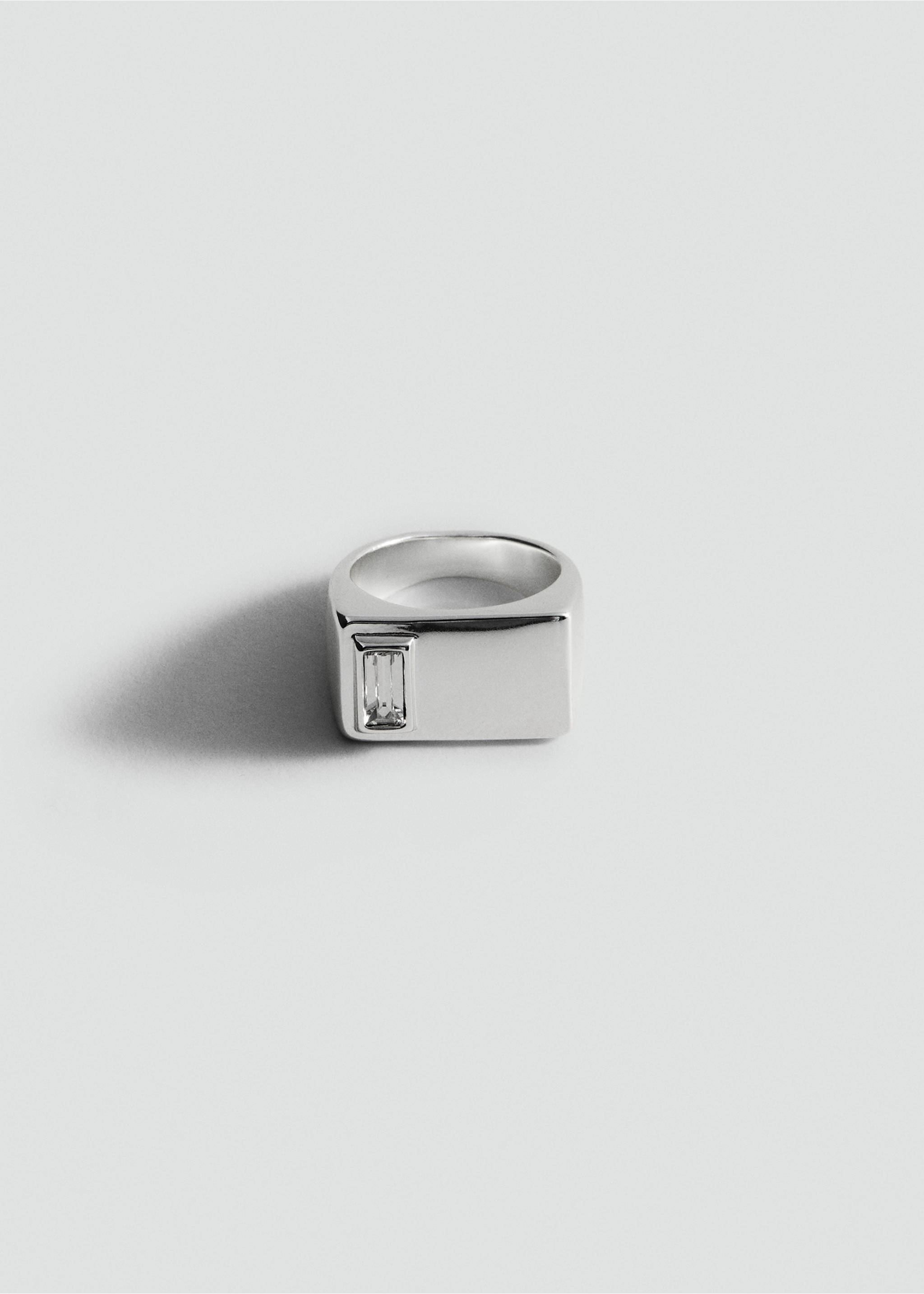 Silver-tone signet ring with a flat rectangular face and an inset clear stone., Silver. Ref: 27097788-00.