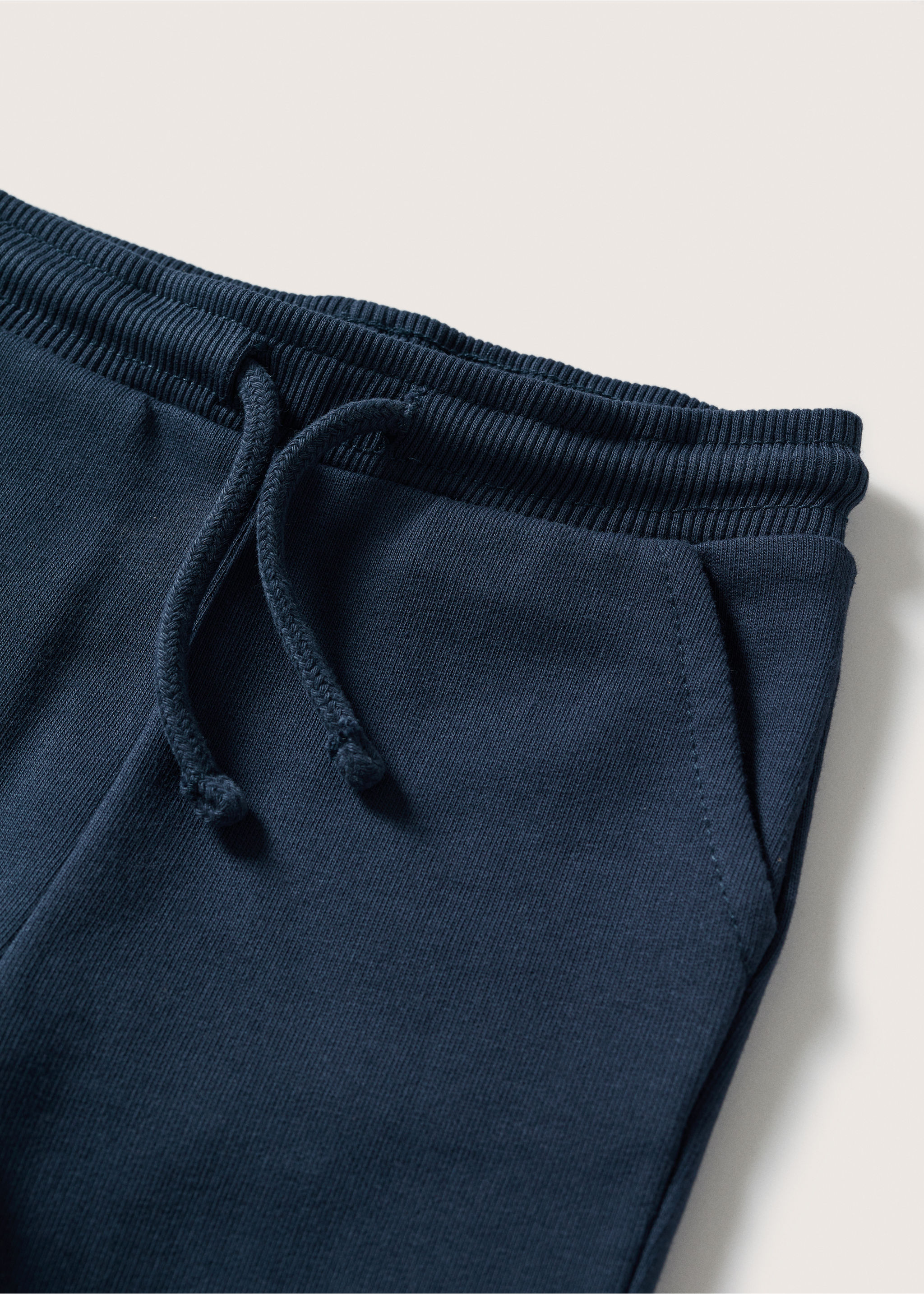 Cotton jogger-style trousers - Details of the article 8