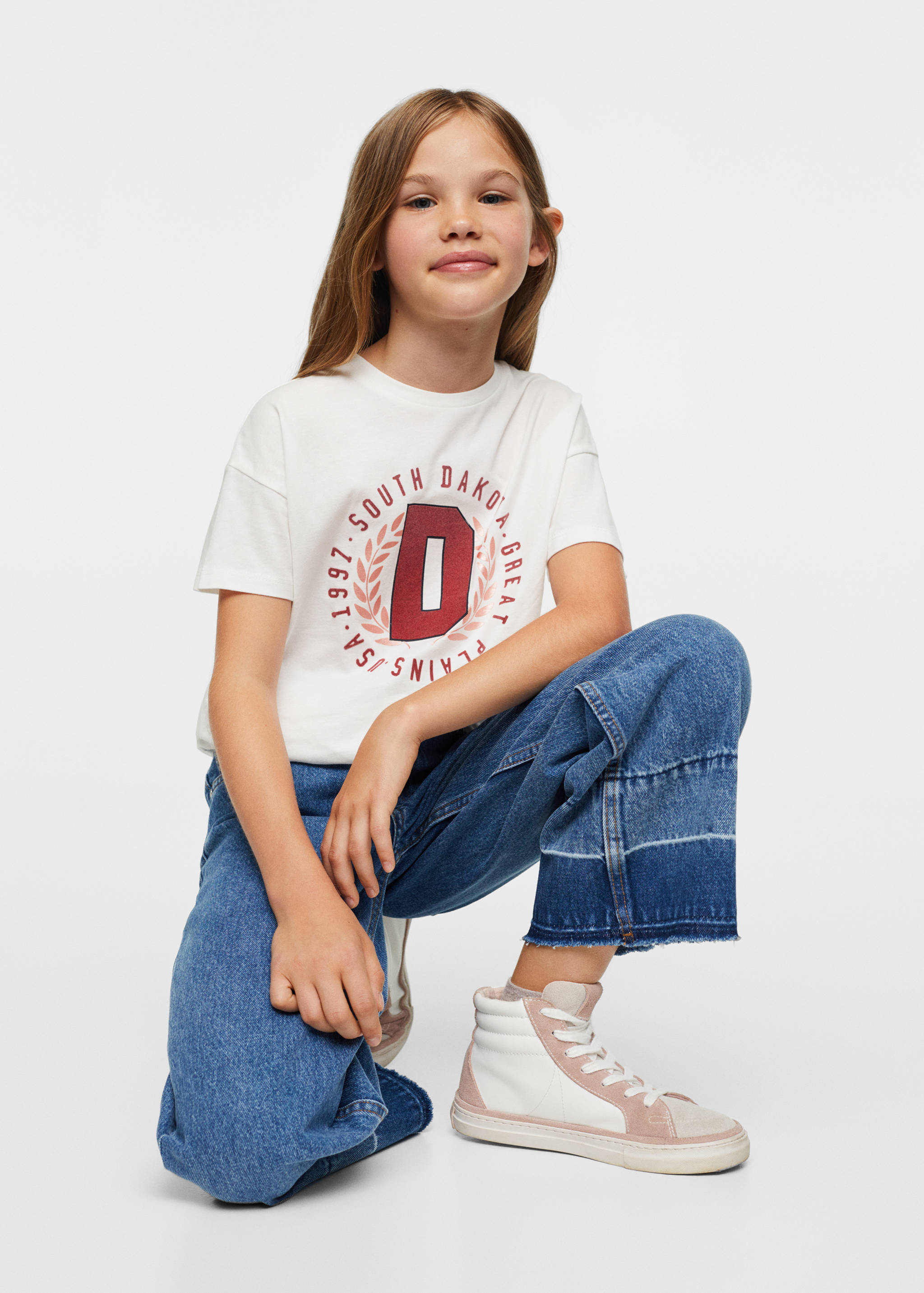 Mönstrad t-shirt med knyt - Bild av mittparti