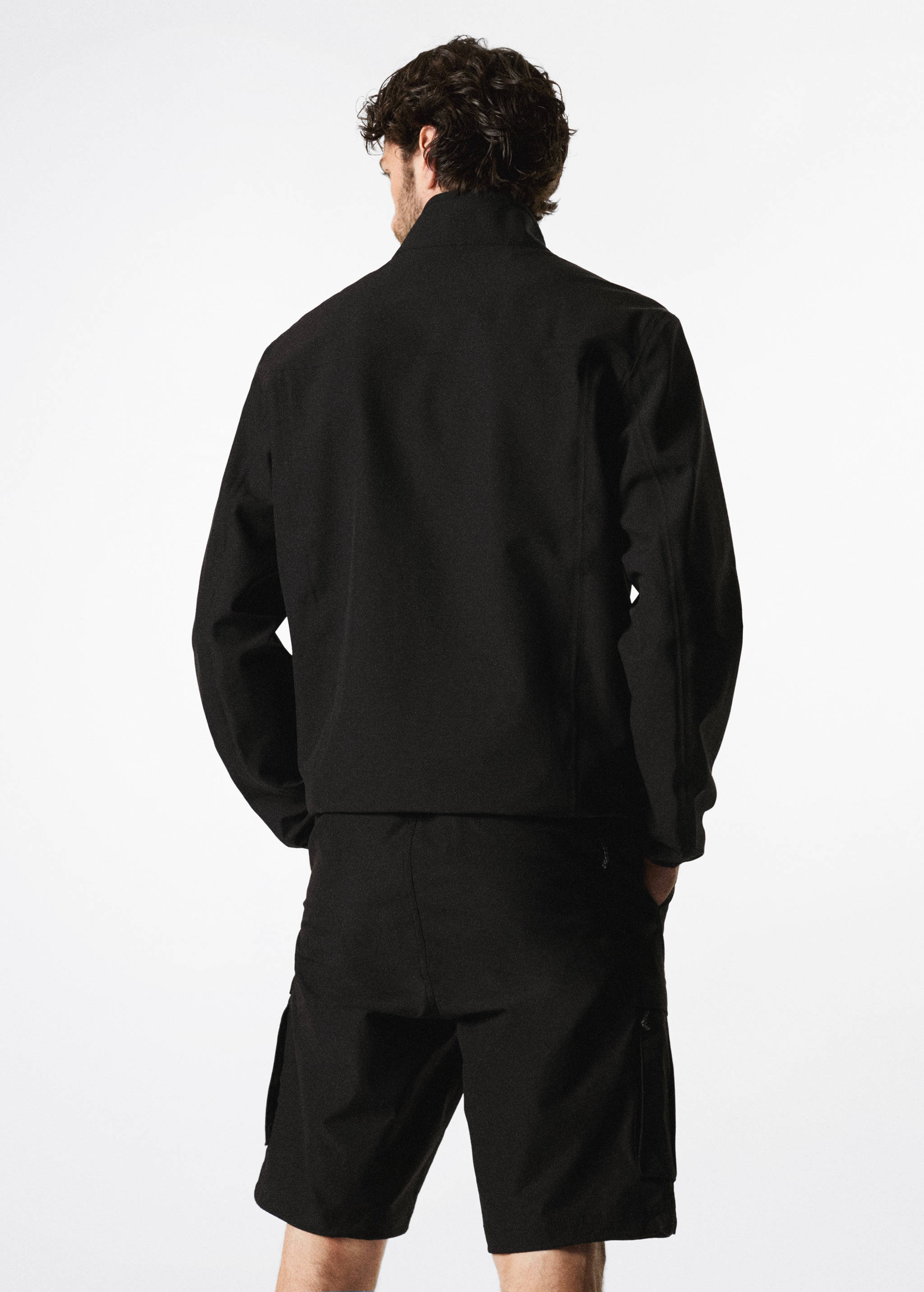 Chaqueta cortavientos impermeable - Reverso del artículo