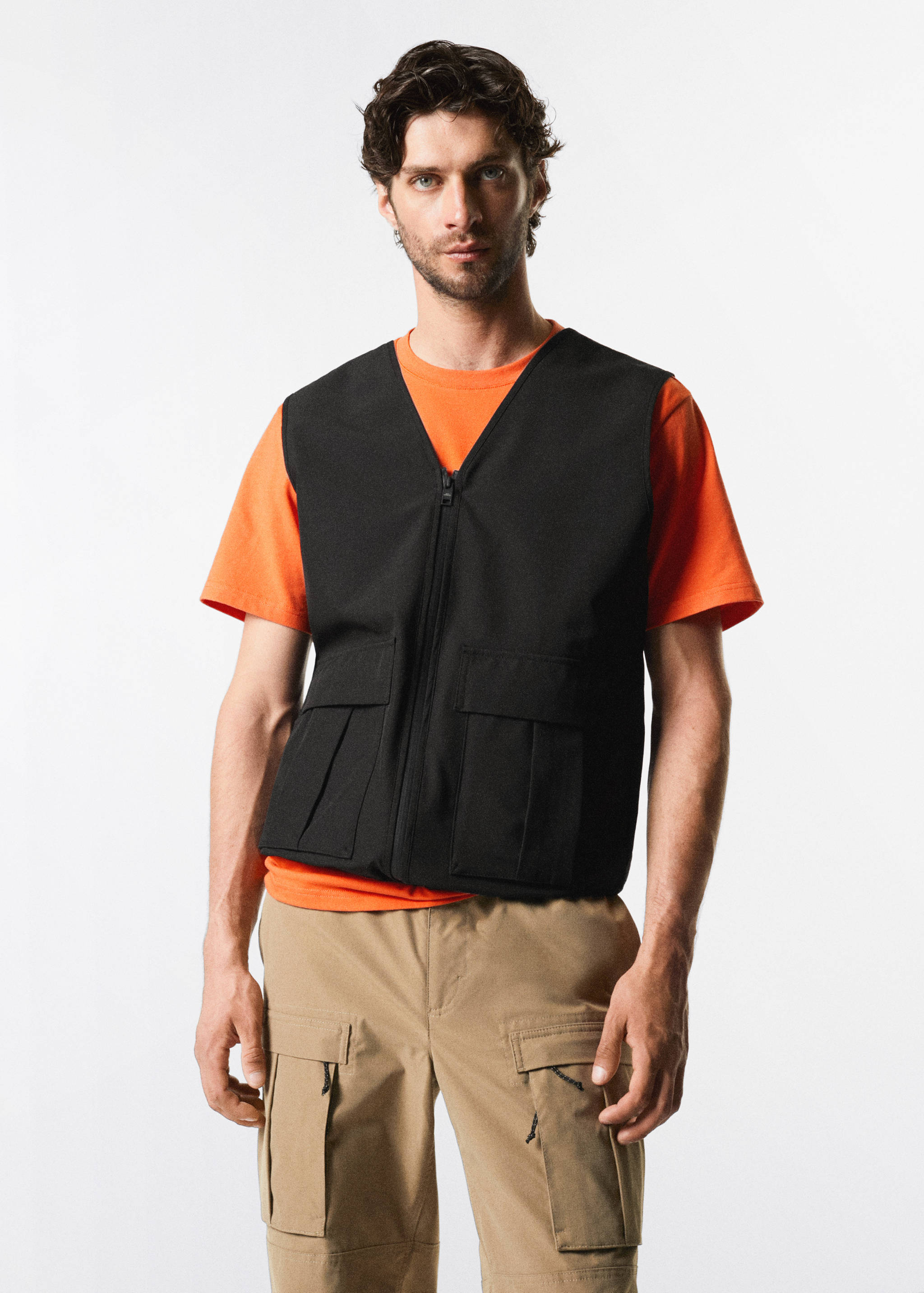 Armilla multibutxaques impermeable - Pla mig