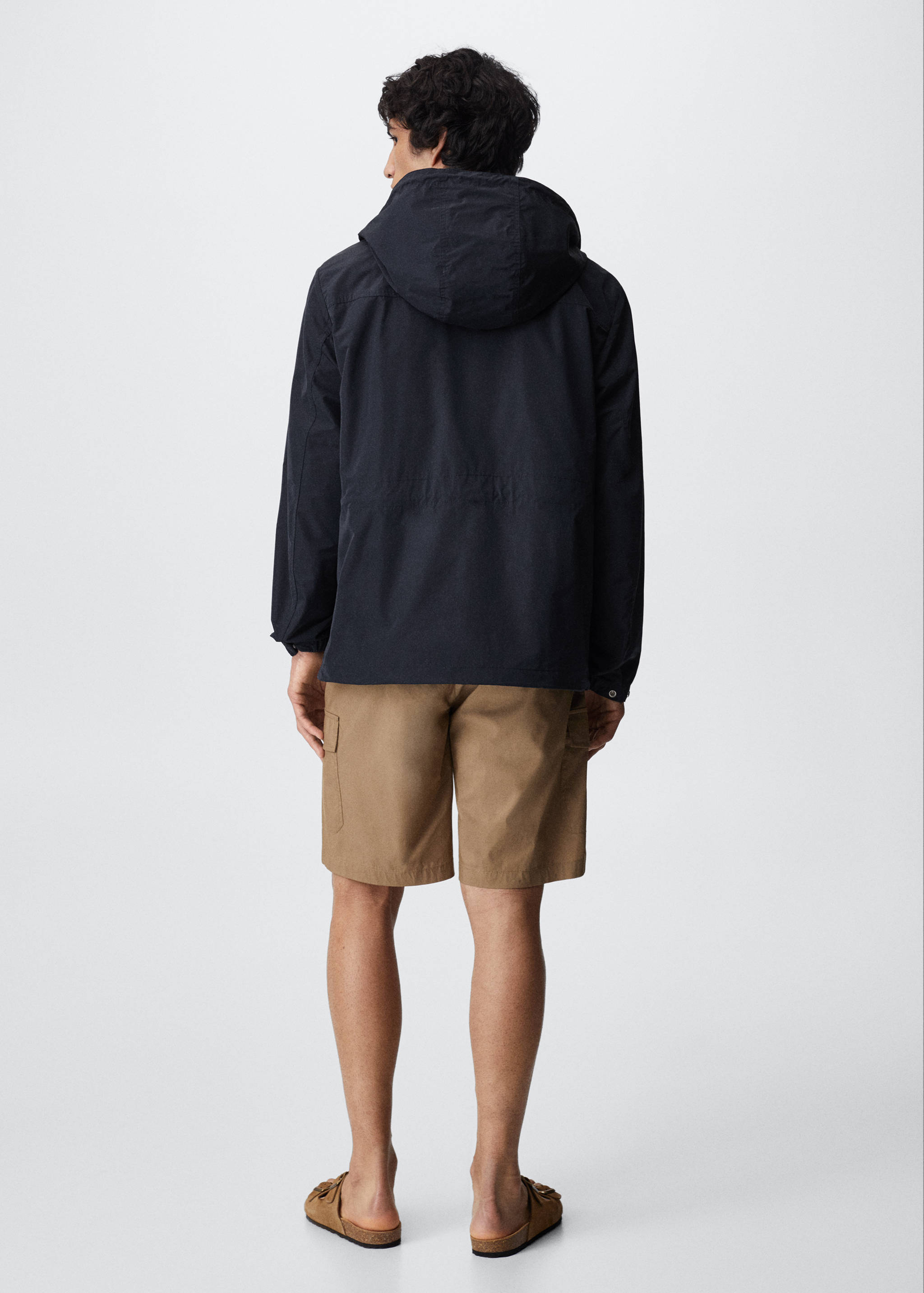 Raincoat hooded jacket - Reverse of the article