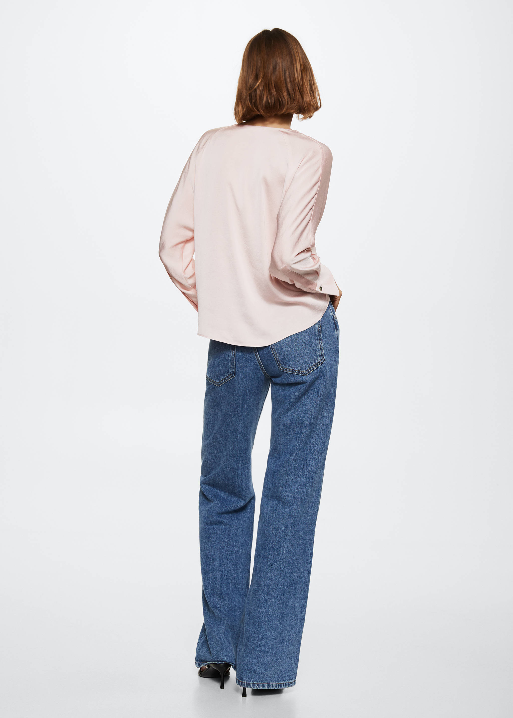 Brusa fluida llaç - Revers de l'article