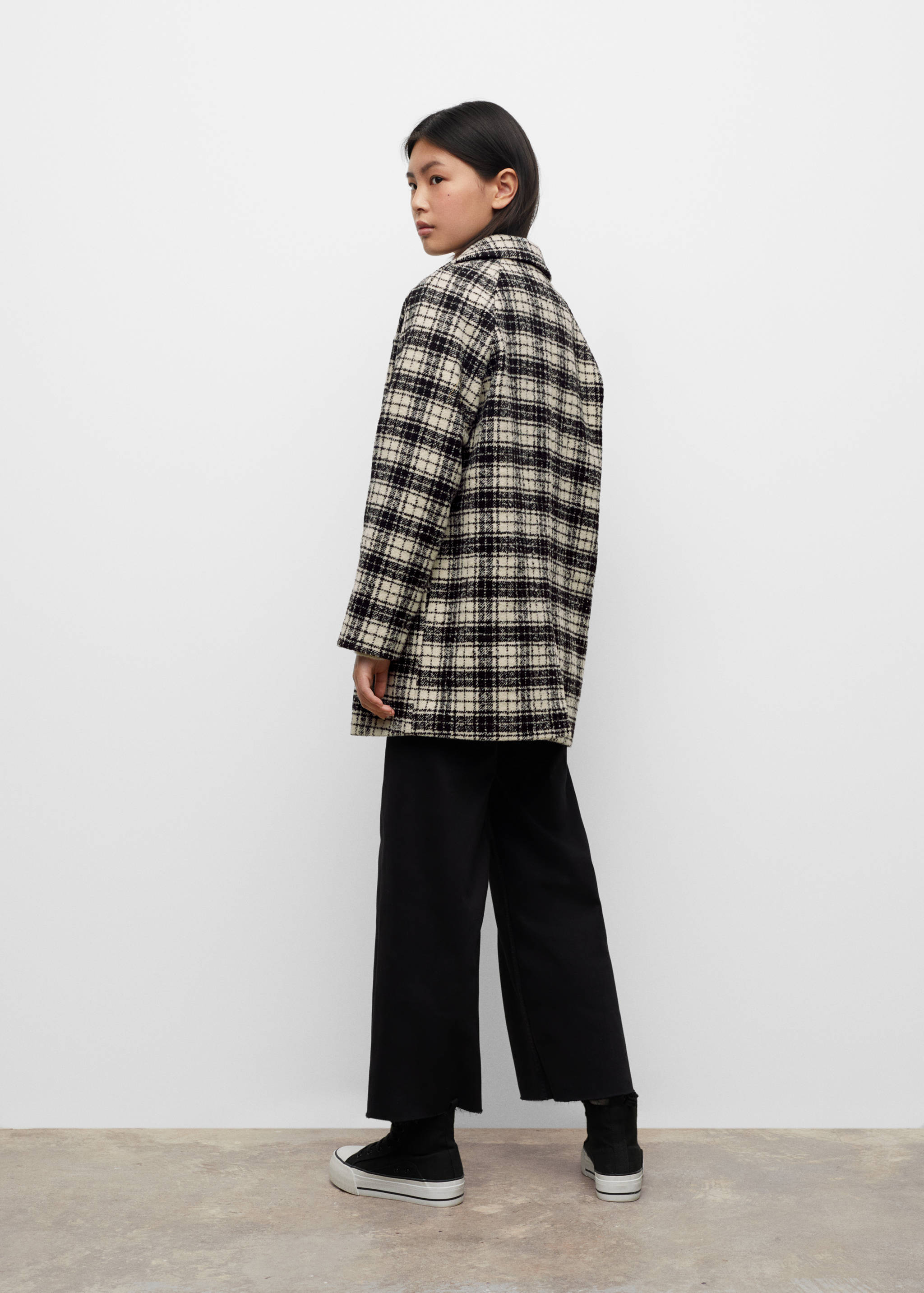 Checked lapels coat - Reverse of the article