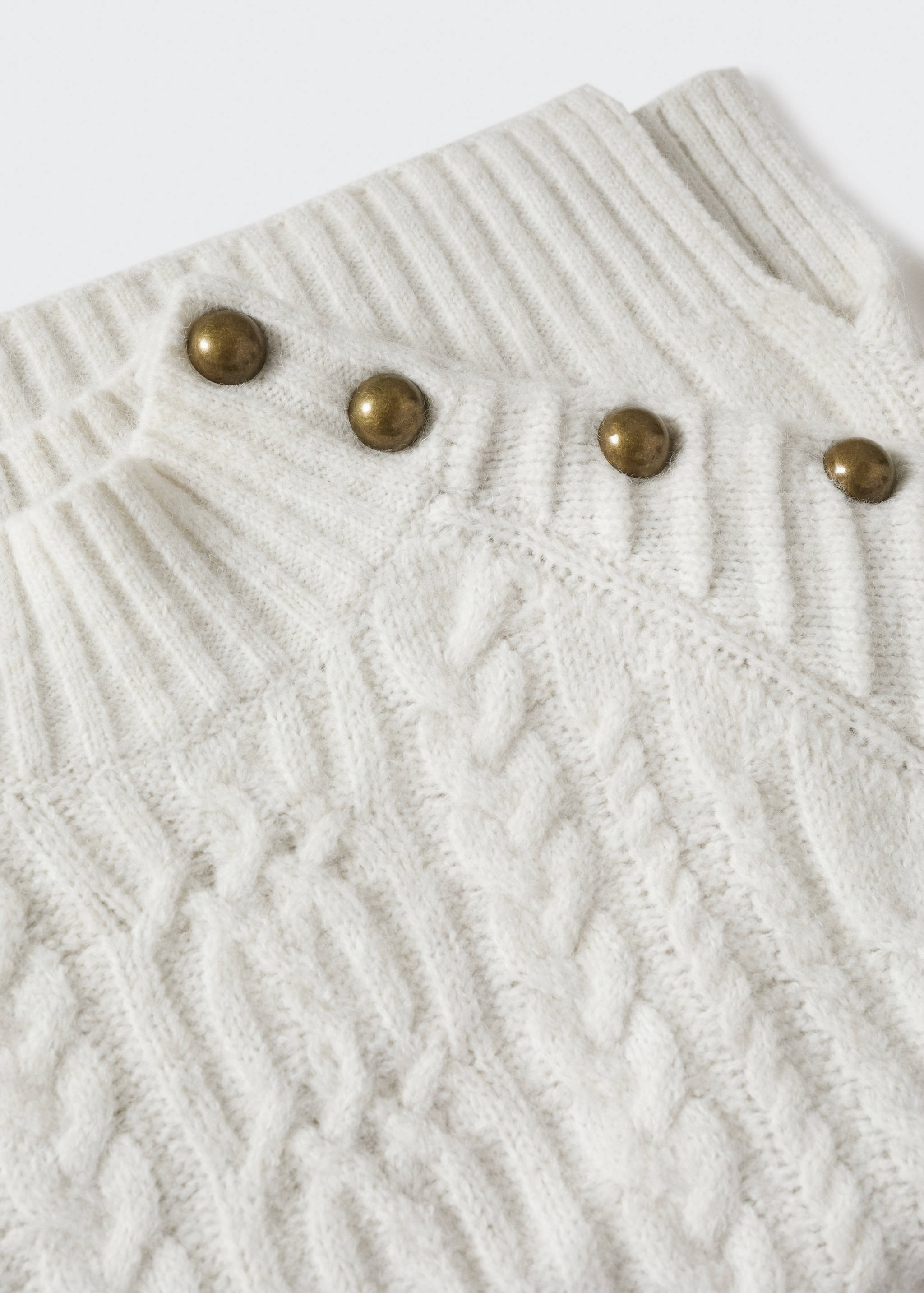 Geknöpfter Strickpullover mit Zopfmuster - Detail des Artikels 8