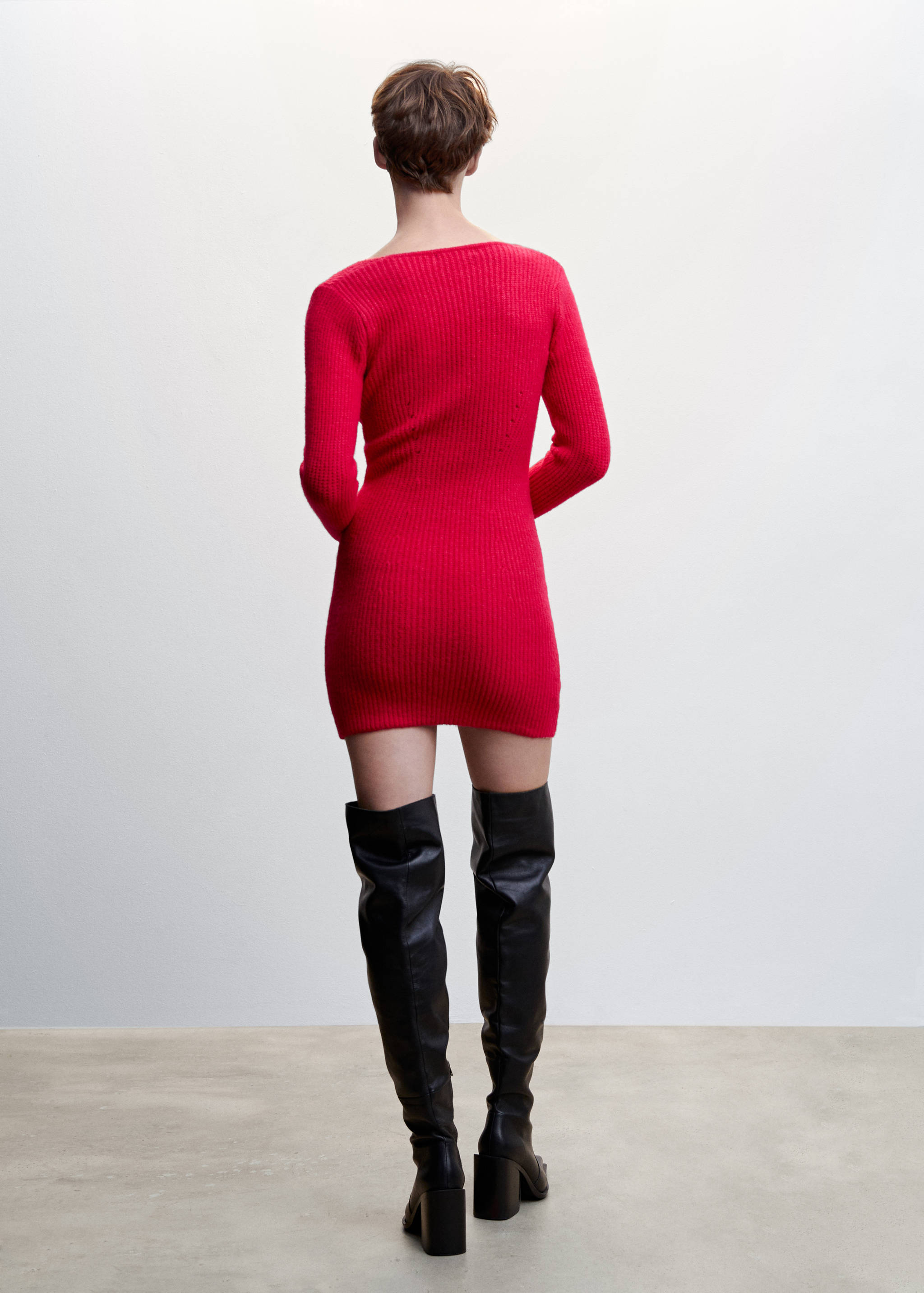 Short knitted dress - Reverse of the article