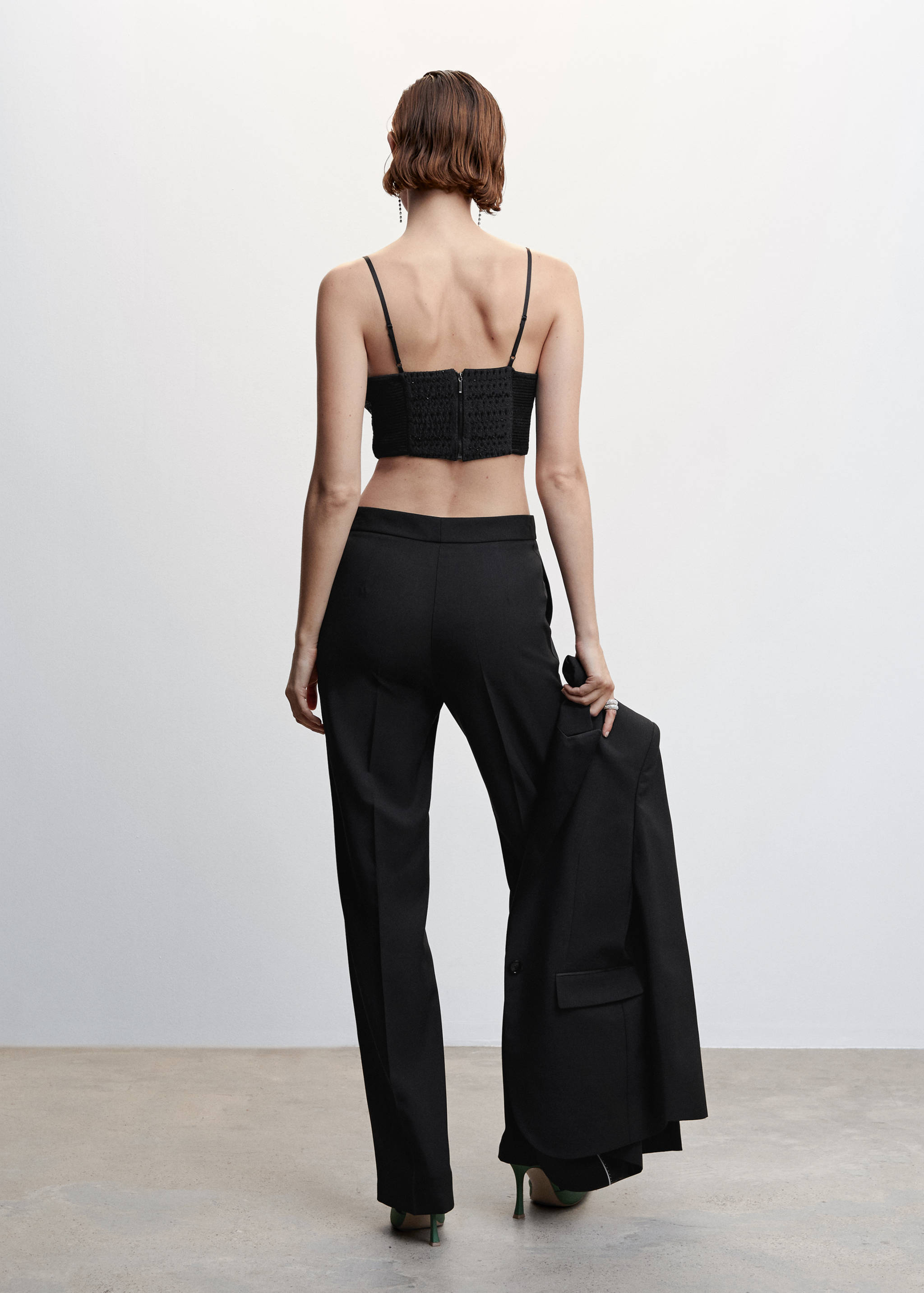 Glittrig korsettopp - Artikelns baksida