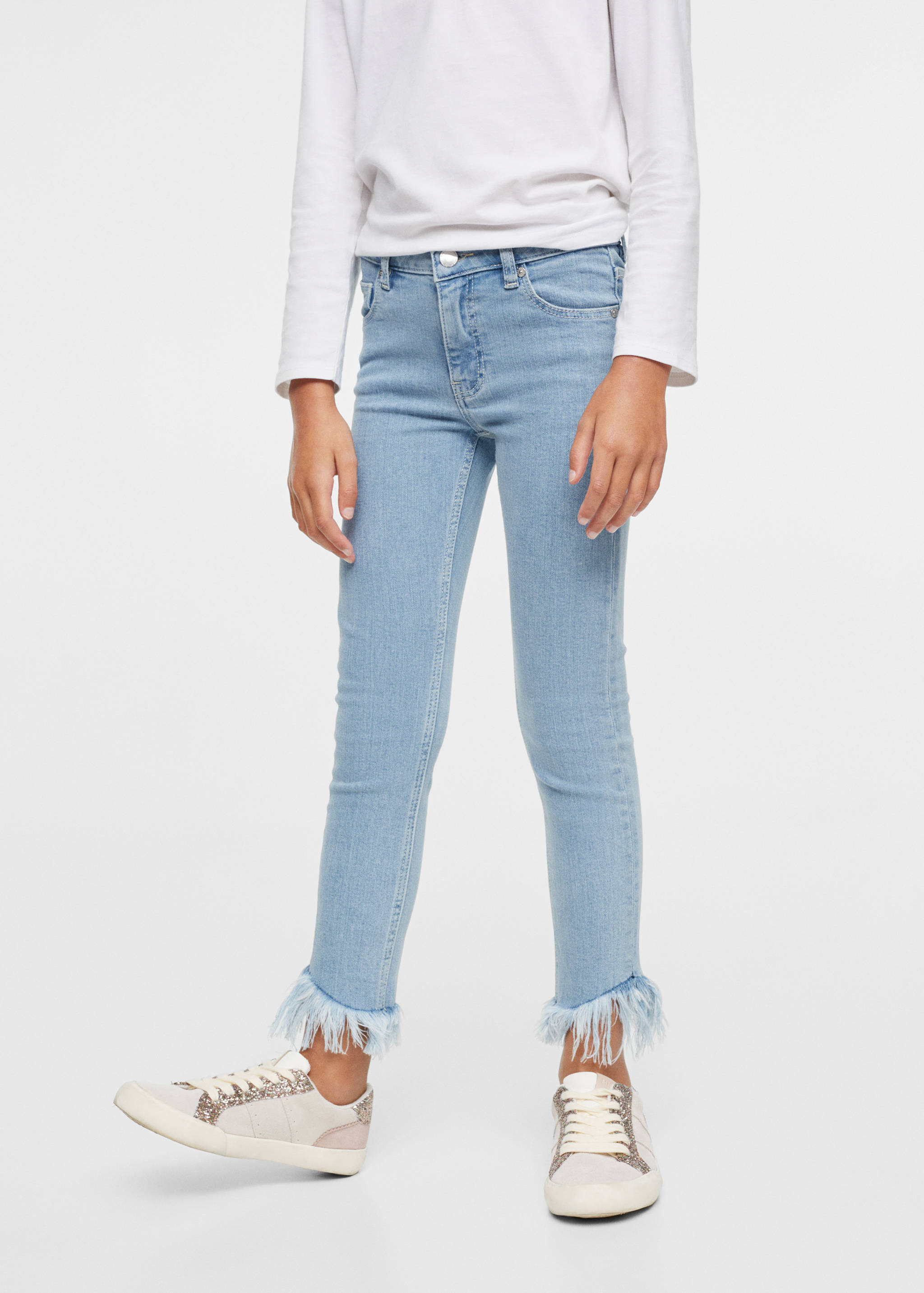Skinny jeans with frayed hem  - Details of the article 1