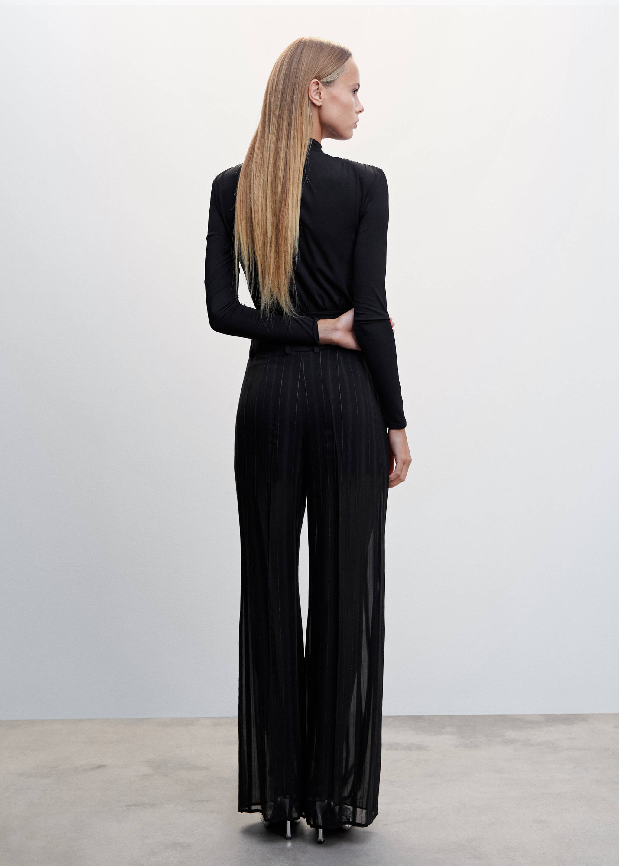 Semi-transparent pinstripe trousers - Reverse of the article