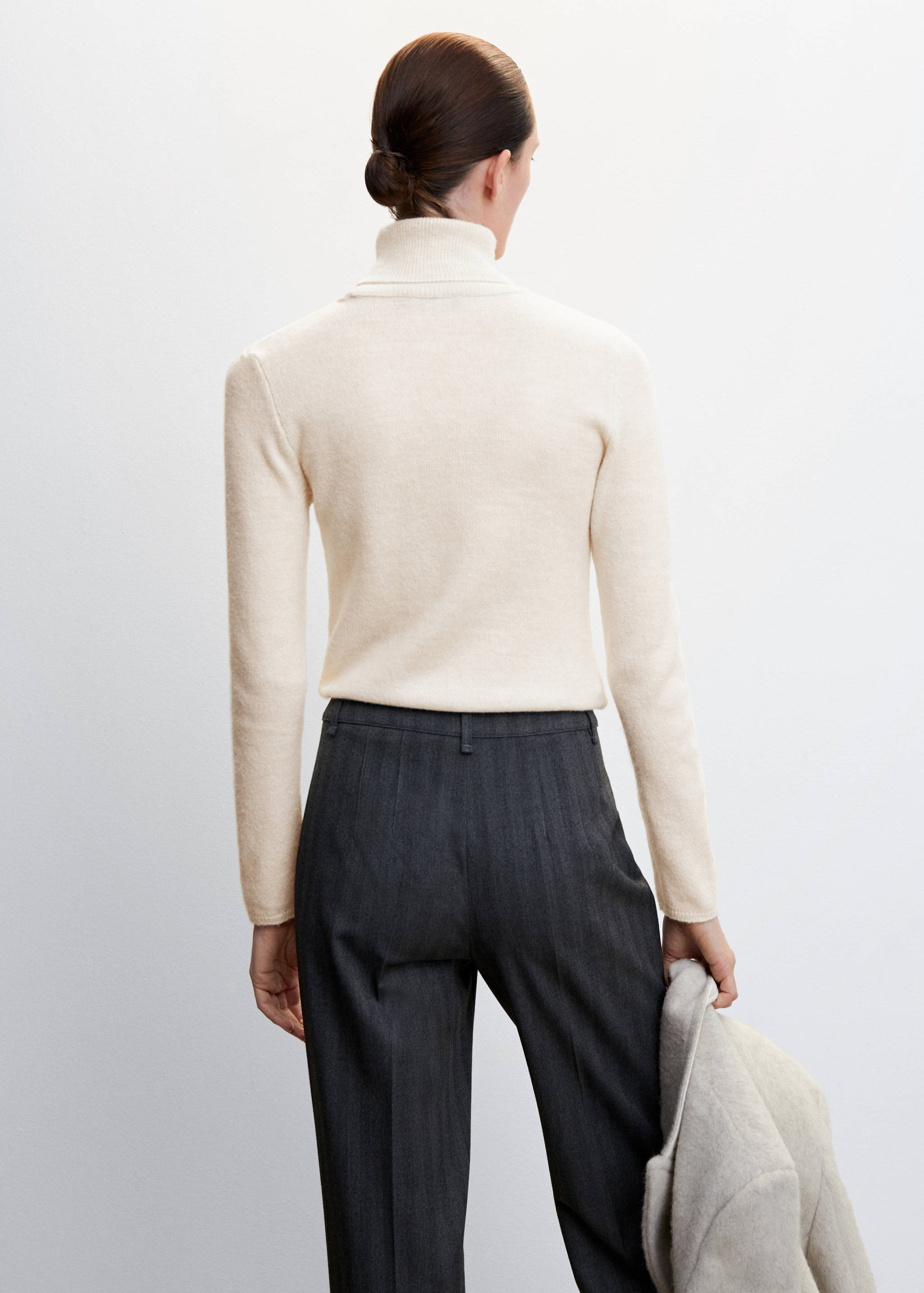 Turtleneck knitted sweater - Reverse of the article